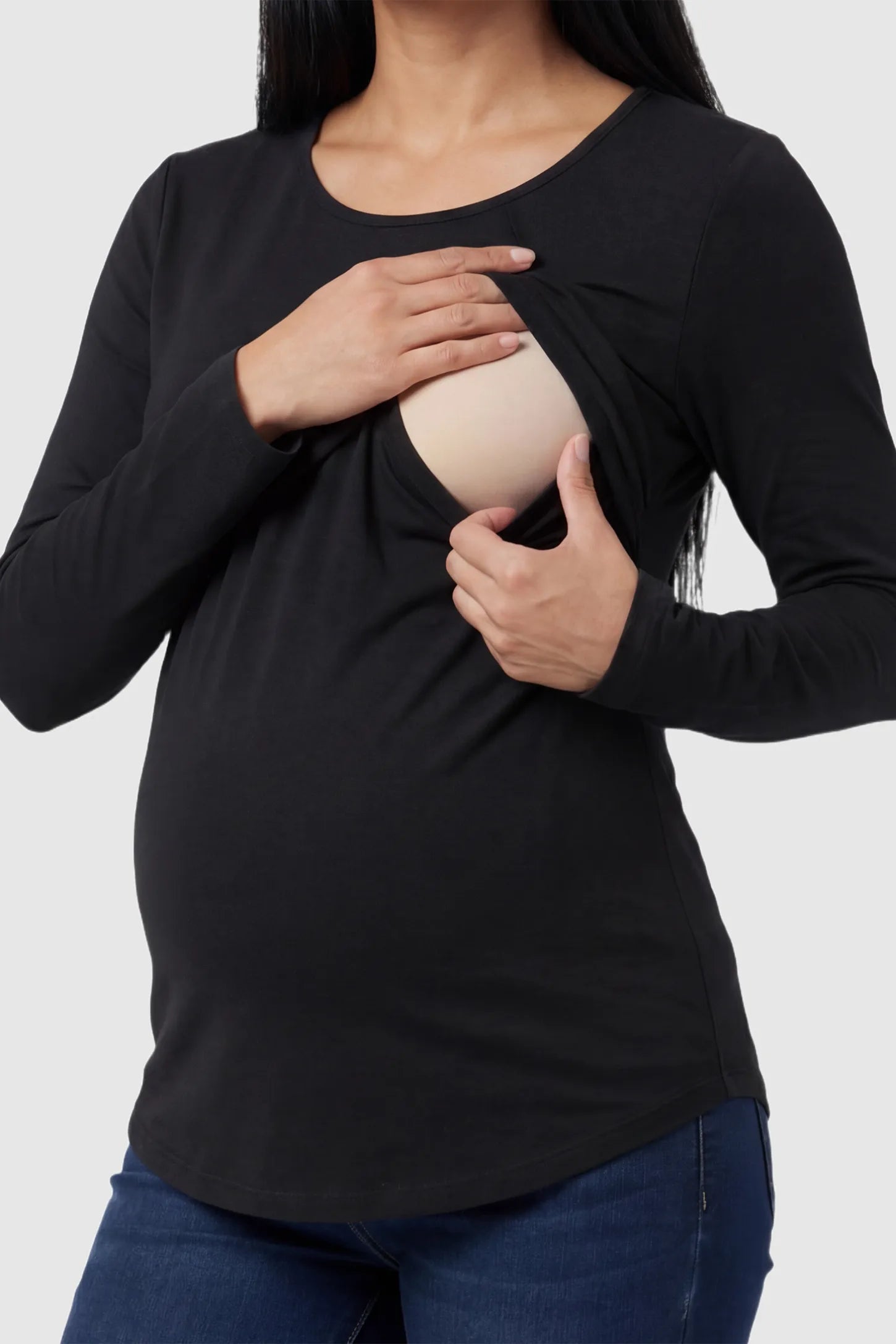 Solid Crew Neck Long Sleeve Maternity & Nursing Top Solid Crew Neck Long Sleeve Maternity & Nursing Top in Black featuring a discreet lift-up breastfeeding access on a model.