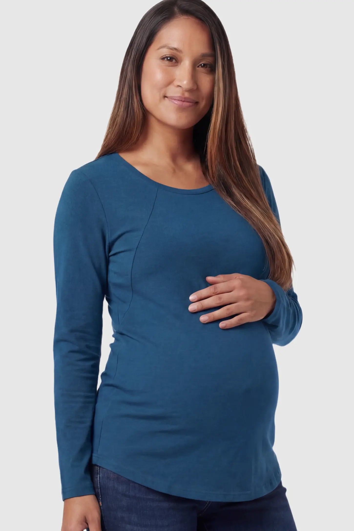 Solid Crew Neck Long Sleeve Maternity & Nursing Top Solid Crew Neck Long Sleeve Maternity & Nursing Top in Blue featuring a discreet lift-up breastfeeding access on a model.