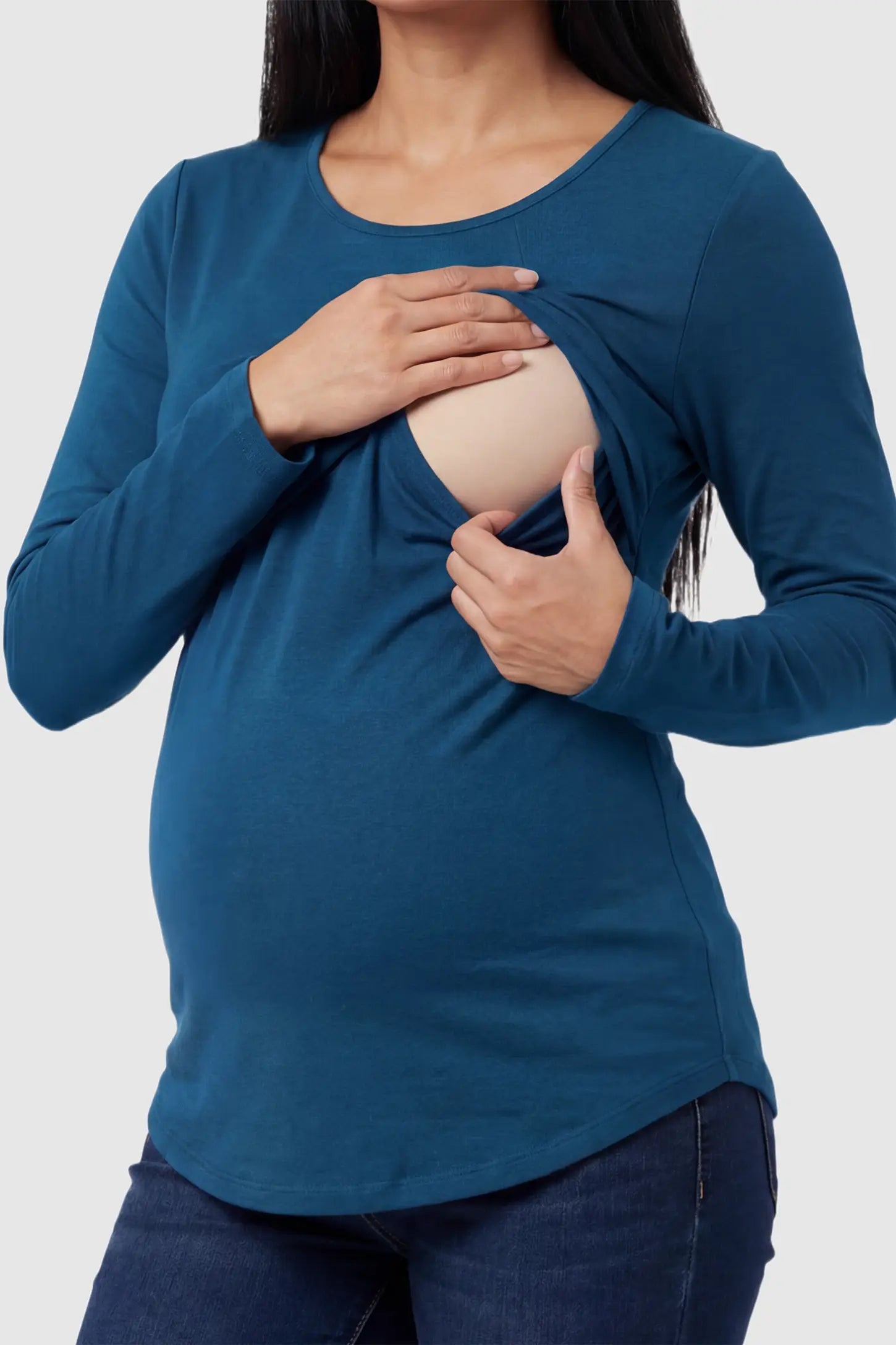 Solid Crew Neck Long Sleeve Maternity & Nursing Top Solid Crew Neck Long Sleeve Maternity & Nursing Top in Blue featuring a discreet lift-up breastfeeding access on a model.