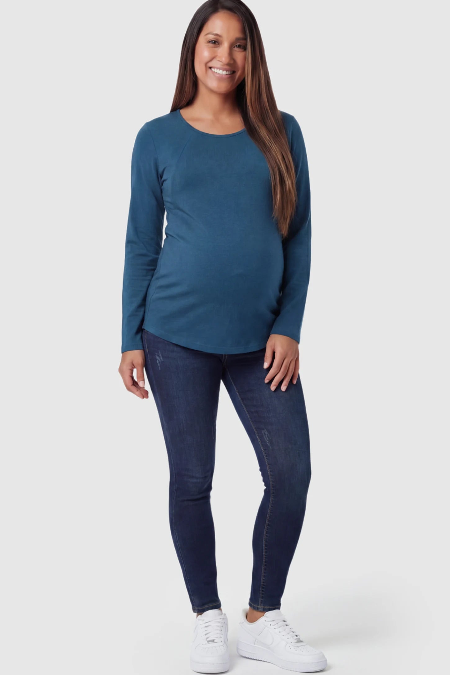Solid Crew Neck Long Sleeve Maternity & Nursing Top Solid Crew Neck Long Sleeve Maternity & Nursing Top in Blue featuring a discreet lift-up breastfeeding access on a model.