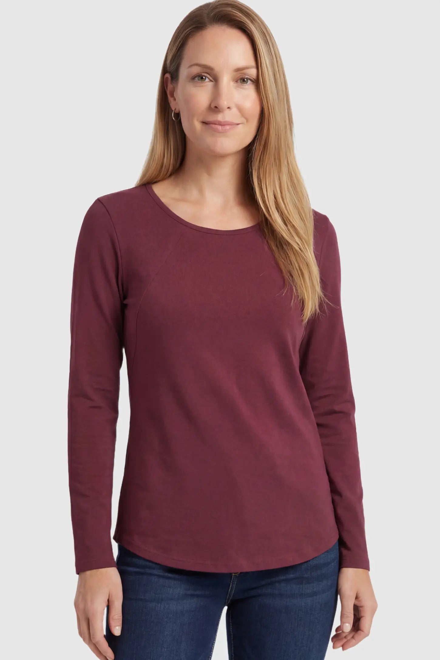 Solid Crew Neck Long Sleeve Maternity & Nursing Top Solid Crew Neck Long Sleeve Maternity & Nursing Top in Wine Red featuring a discreet lift-up breastfeeding access on a model.
