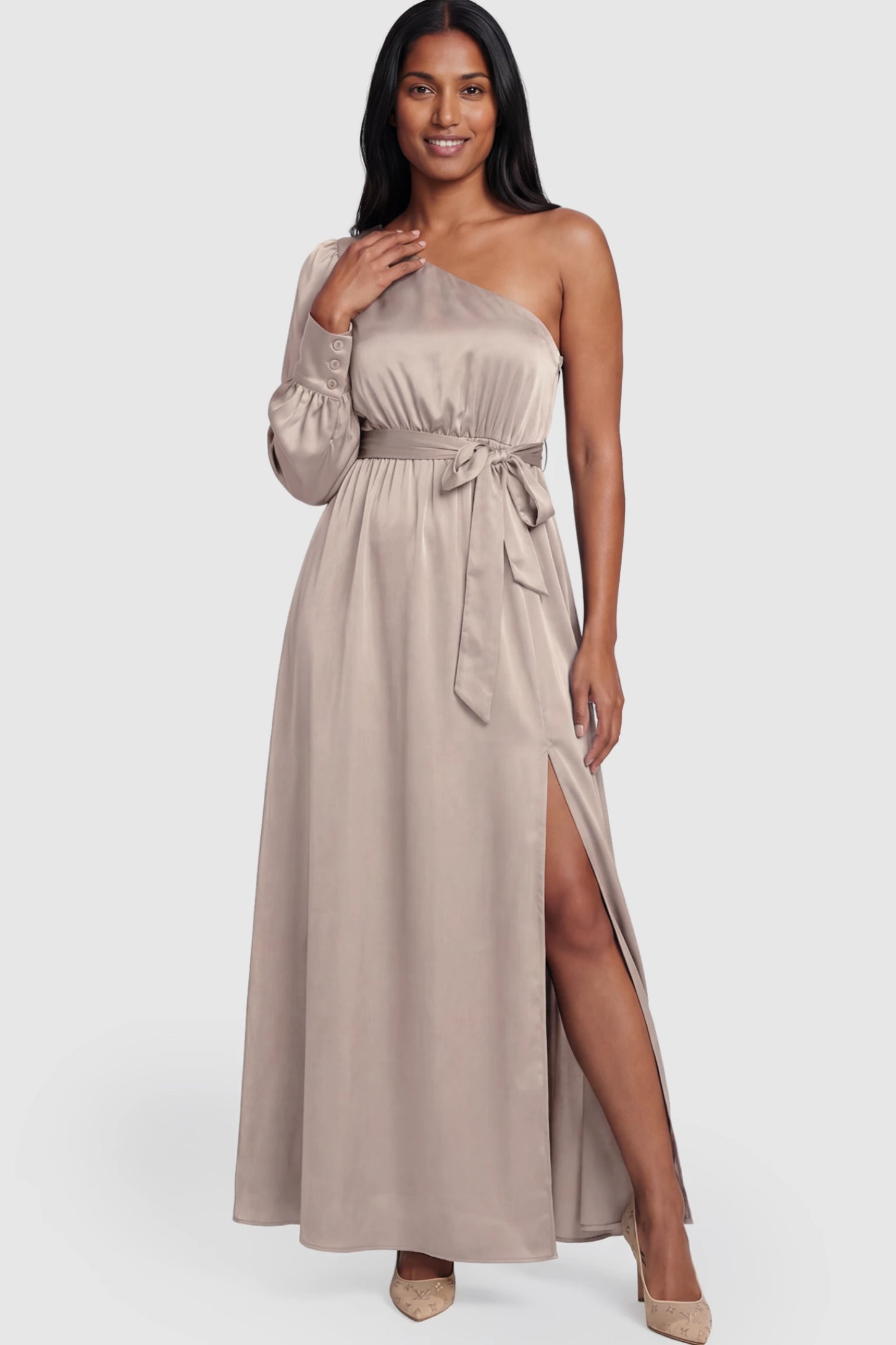 Satin One Shoulder Belted Maternity Maxi Dress Satin One-Shoulder Belted Maternity Maxi Dress in Light gray featuring a side slit and waist tie on a postpartum model.