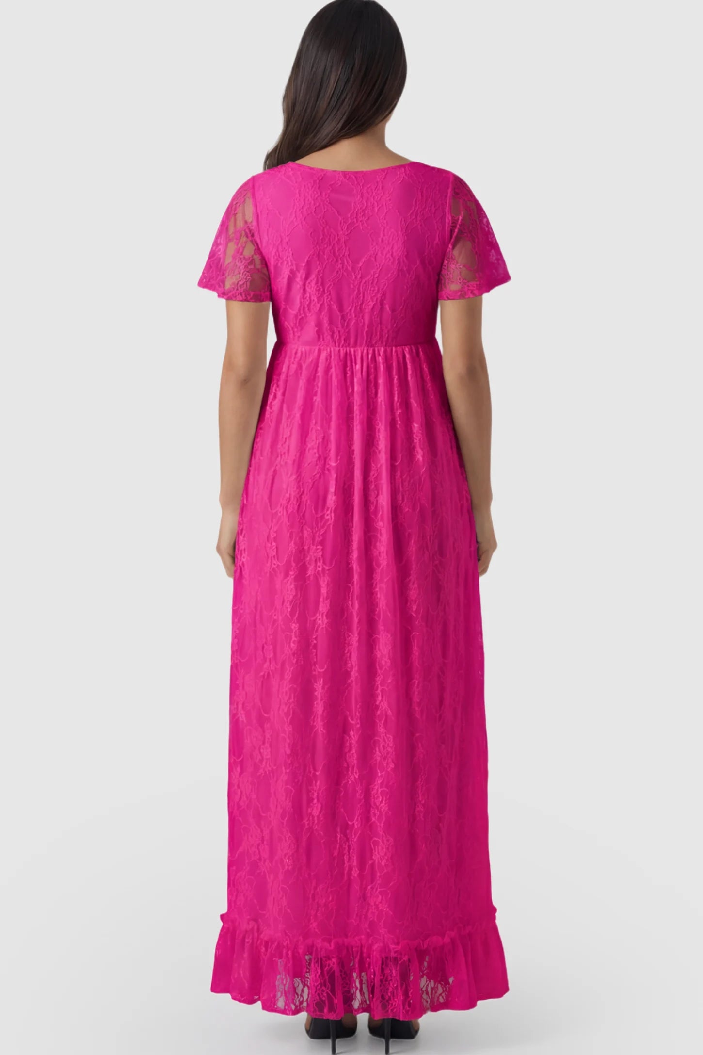 Floral Lace Flutter Sleeve Maternity Maxi Dress Floral Lace Flutter Sleeve Maxi Maternity Dress in Hot Pink featuring delicate lace and an empire waist on a pregnant model.