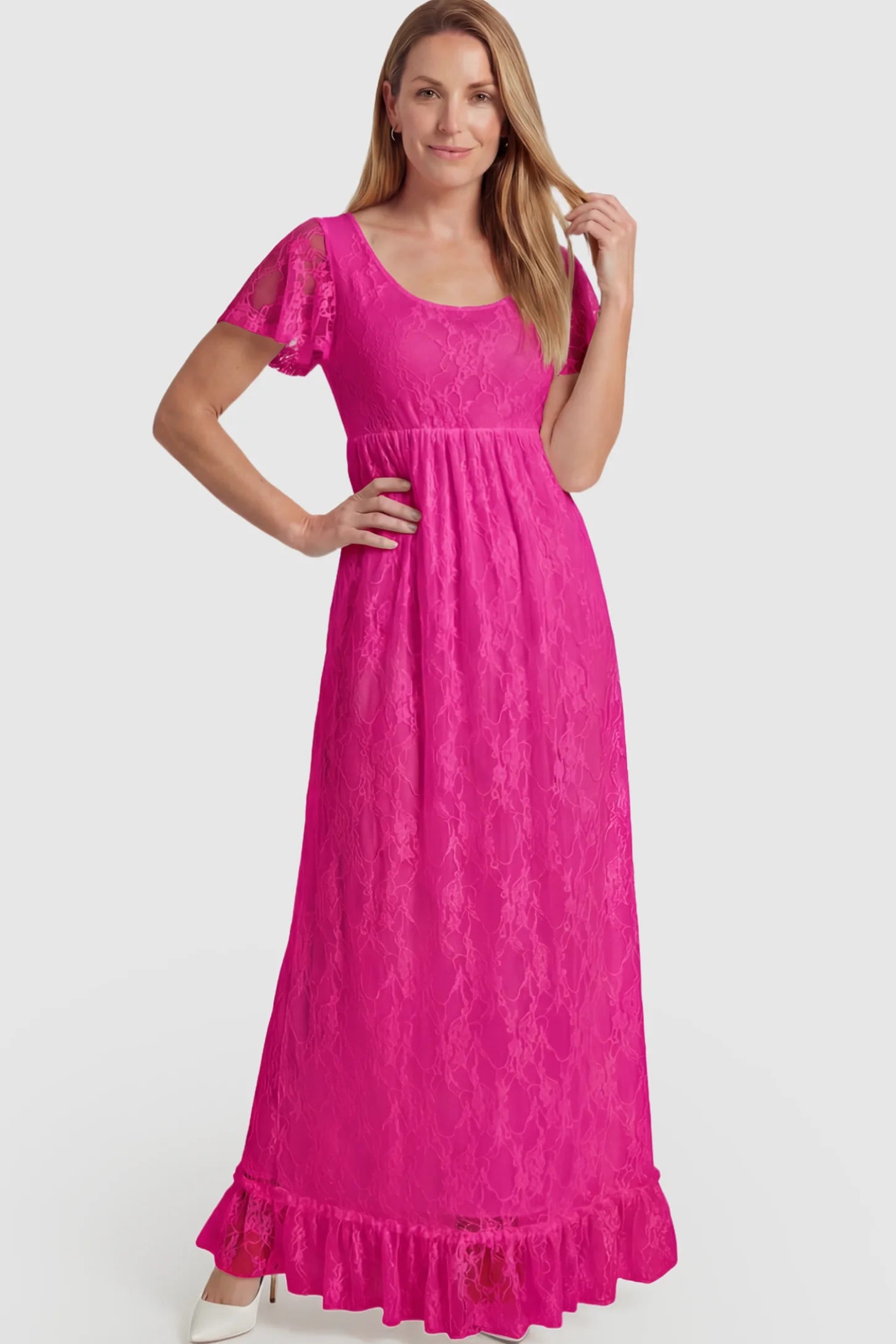 Floral Lace Flutter Sleeve Maternity Maxi Dress Floral Lace Flutter Sleeve Maxi Maternity Dress in Hot Pink featuring delicate lace and an empire waist on a pregnant model.