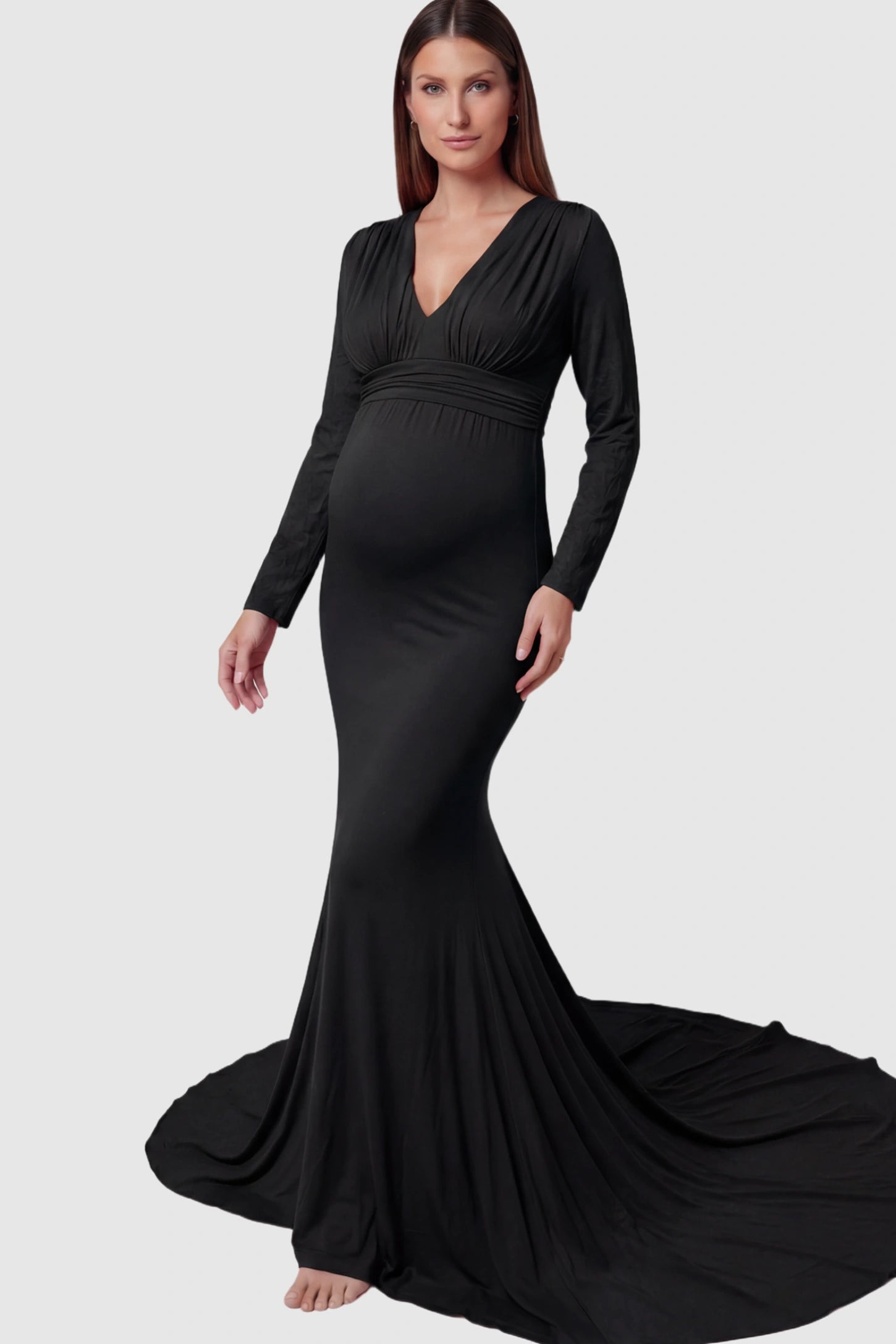 Pure Cotton V-Neck Long Sleeve Maternity Photoshoot Gown Pure Cotton V-Neck Long Sleeve Maternity Photoshoot Gown in Black featuring a floor-pooling train on a pregnant model.