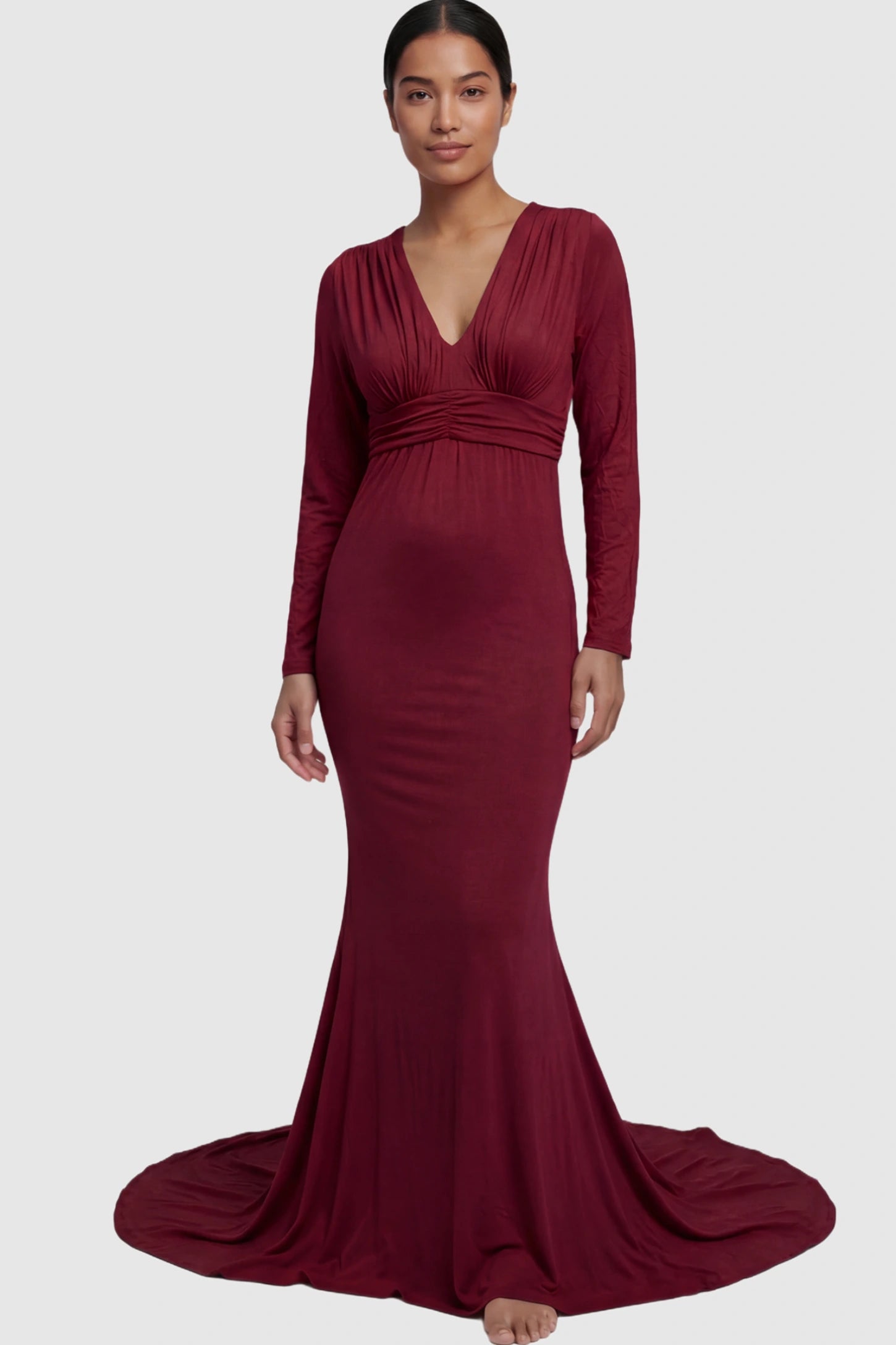 Pure Cotton V-Neck Long Sleeve Maternity Photoshoot Gown Pure Cotton V-Neck Long Sleeve Maternity Photoshoot Gown in Burgundy featuring a floor-pooling train on a postpartum model.