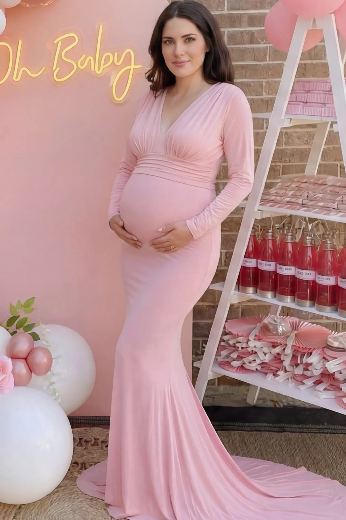 Pure Cotton V-Neck Long Sleeve Maternity Photoshoot Gown Pure Cotton V-Neck Long Sleeve Maternity Photoshoot Gown in Pink featuring a floor-pooling train on a pregnant model.