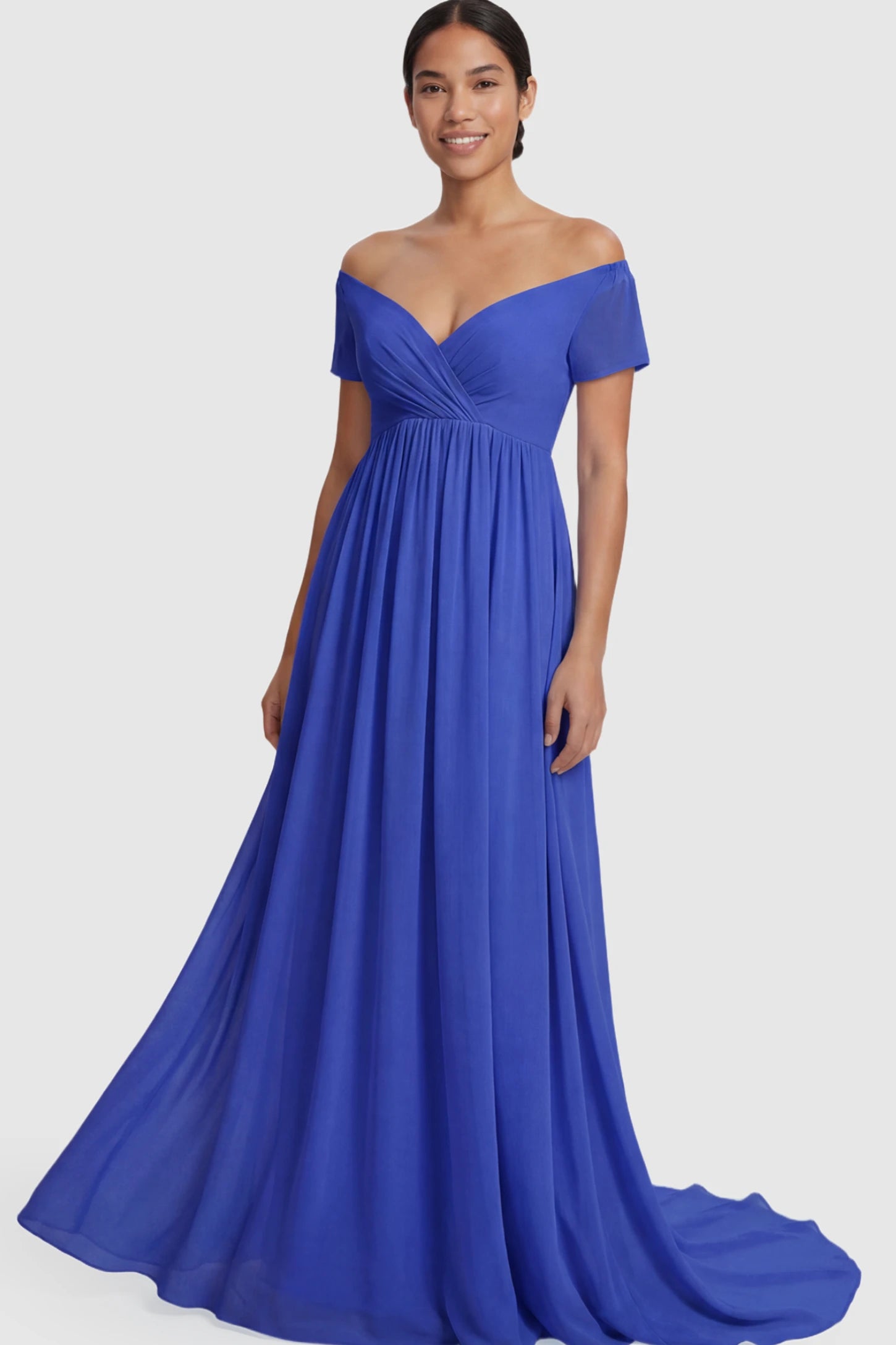 Solid Off Shoulder Flowy Maternity Maxi Dress Solid Off-the-Shoulder Sweetheart Maternity Maxi Dress in Dark Blue featuring an empire waist on a postpartum model.