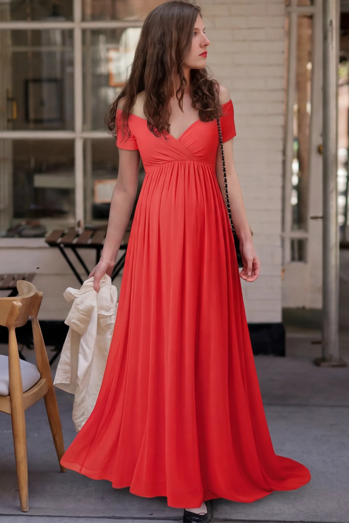 Solid Off Shoulder Flowy Maternity Maxi Dress Solid Off-the-Shoulder Sweetheart Maternity Maxi Dress in Red featuring an empire waist on a pregnant model.