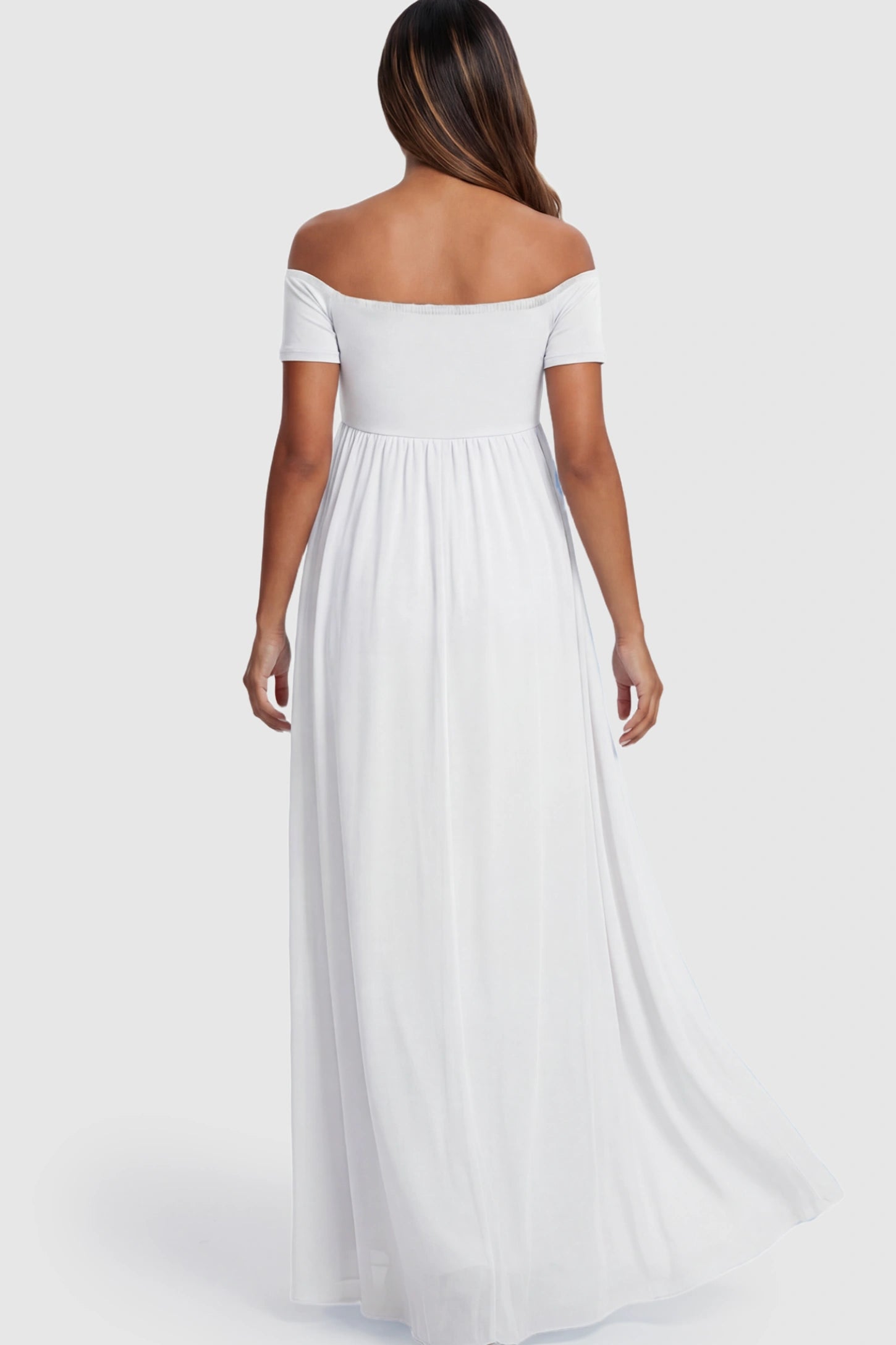 Solid Off Shoulder Flowy Maternity Maxi Dress Solid Off-the-Shoulder Sweetheart Maternity Maxi Dress in White on a pregnant model.