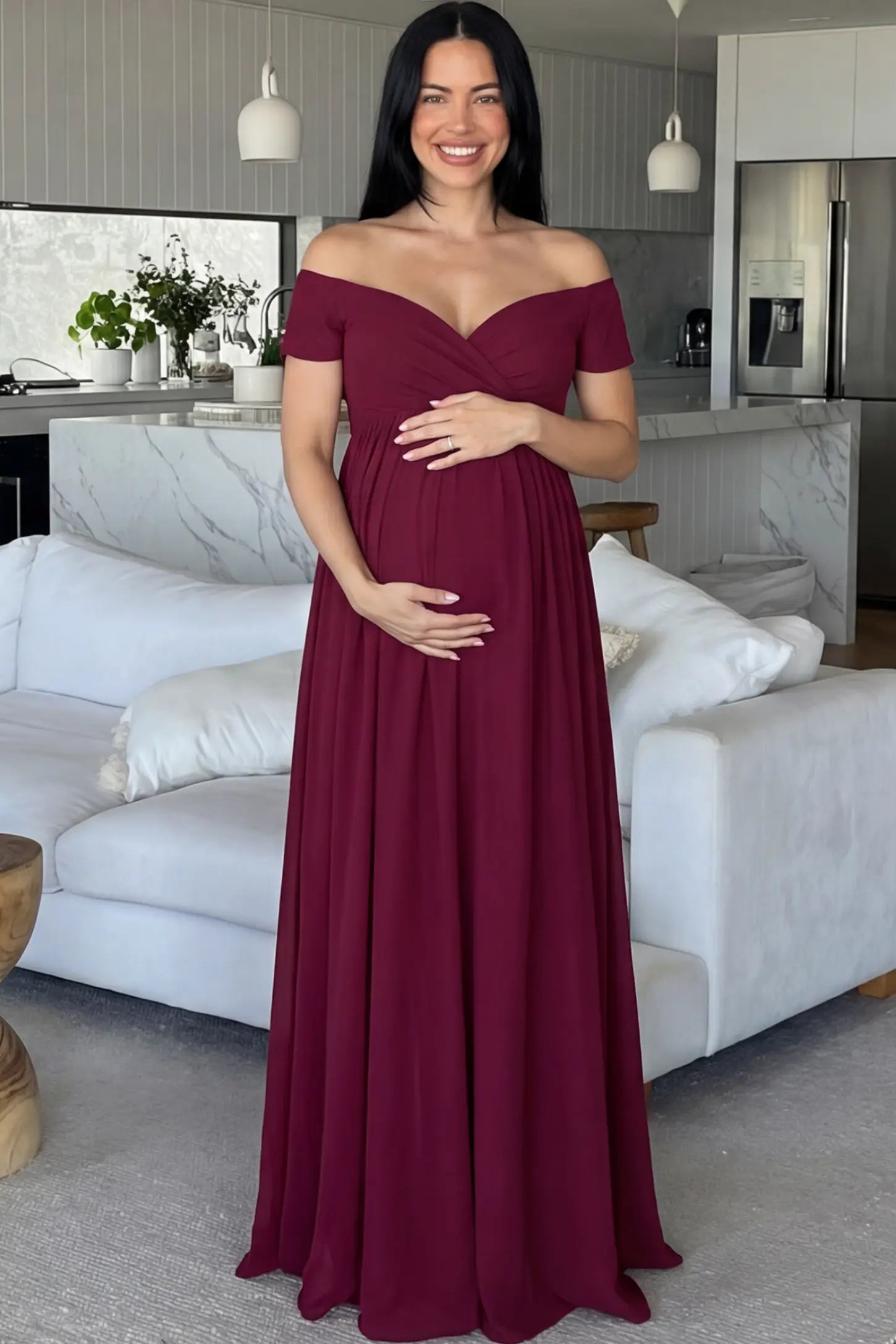 Solid Off-the-Shoulder Sweetheart Maternity Maxi Dress in Wine Red featuring an empire waist on a pregnant model.