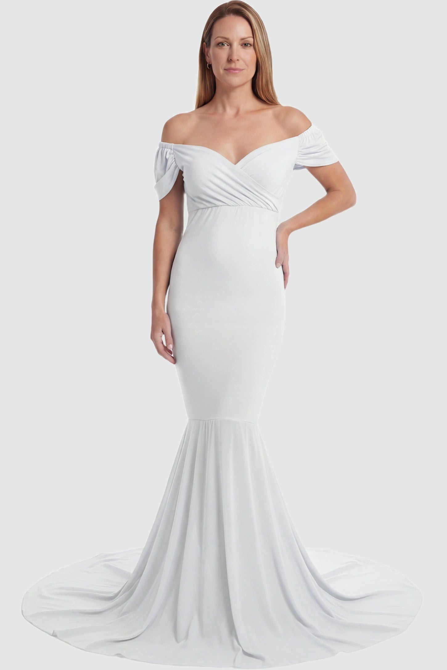 Solid Off Shoulder Fitted Maternity Photoshoot Gown Solid Off Shoulder Fitted Maternity Photoshoot Gown in white featuring a sweetheart cross-front bodice and flowing chiffon train on a postpartum model.