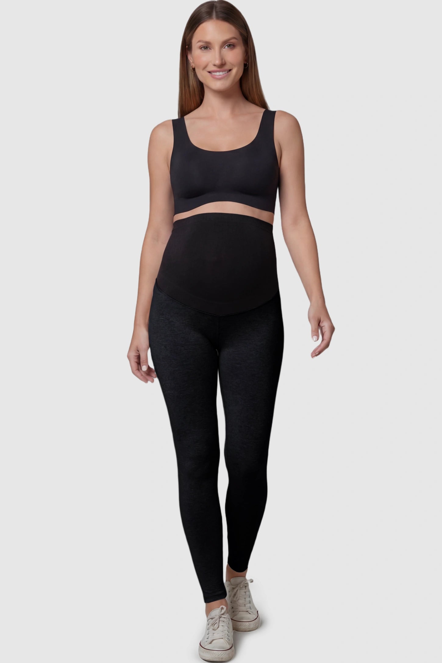High Waist Full Panel Stretch Fit Maternity Leggings in Black featuring a seamless over-the-belly panel on a pregnant model.