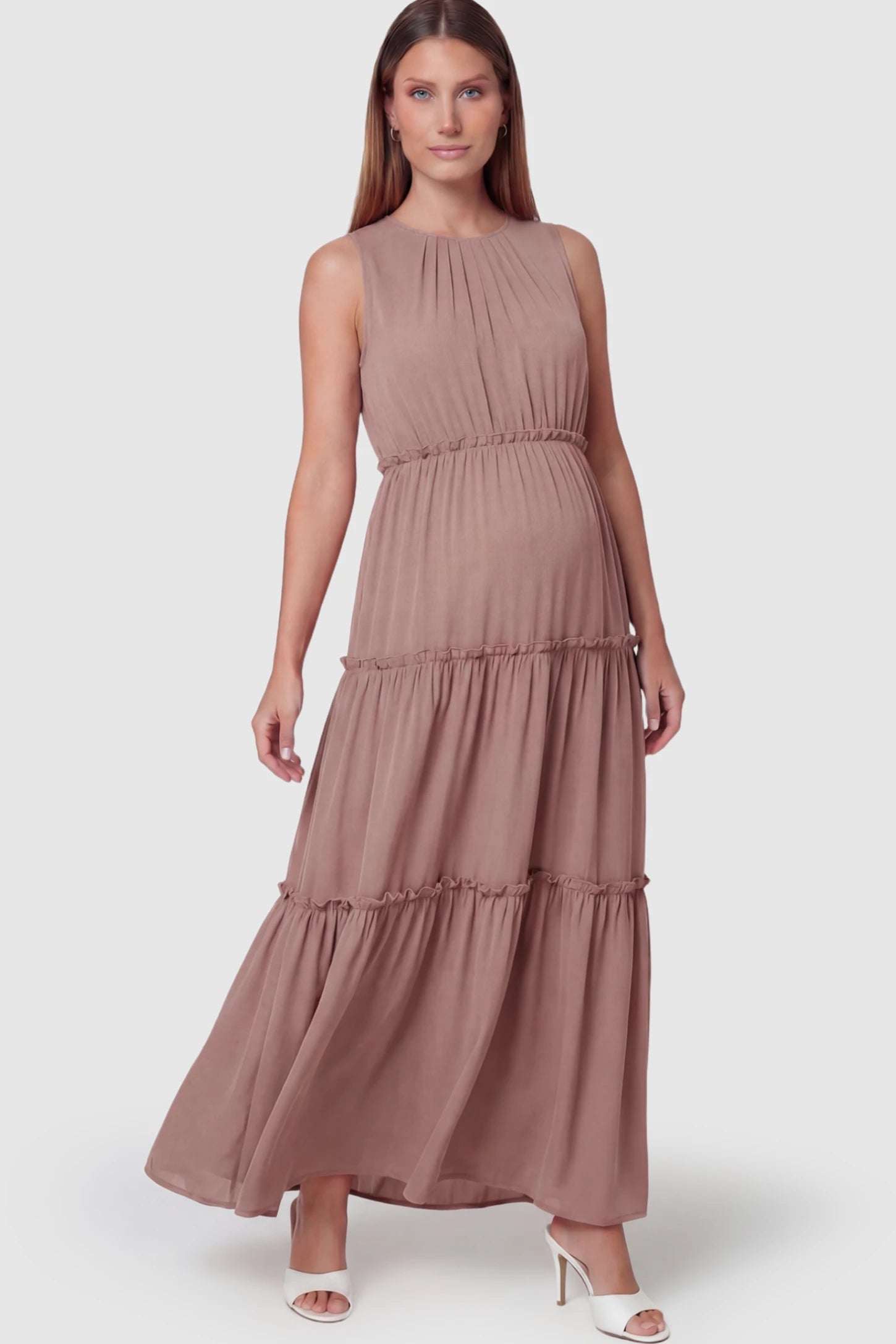 Solid Sleeveless Ruffle Tiered Maternity Midi Dress in Mauve featuring a ruffle tiered skirt on a pregnant model.