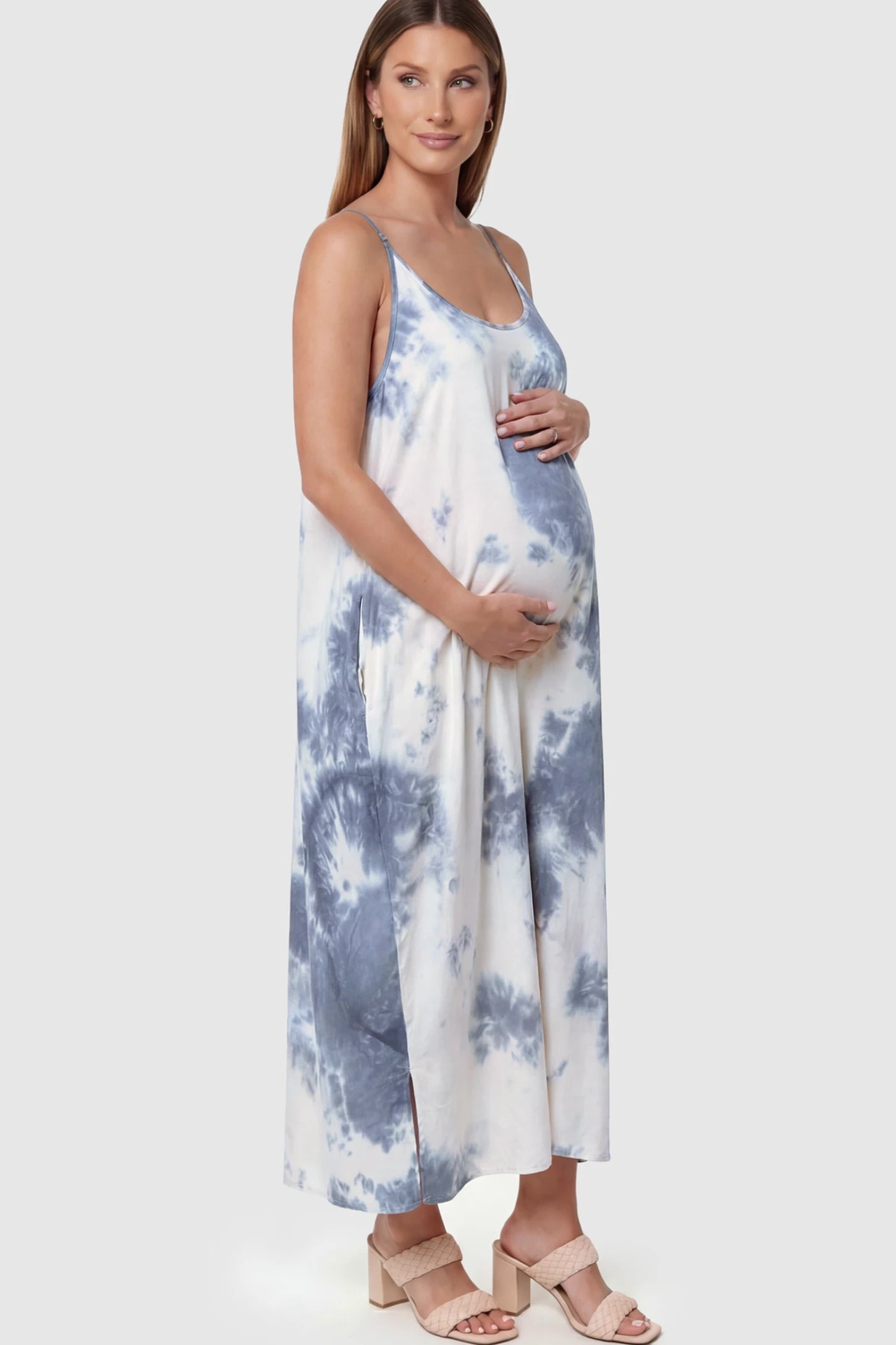 Tie-Dye Print Spaghetti Strap Maternity Maxi Dress Tie-Dye Print Spaghetti Strap Maternity Maxi Dress in Gray and White featuring side pockets on a pregnant model.