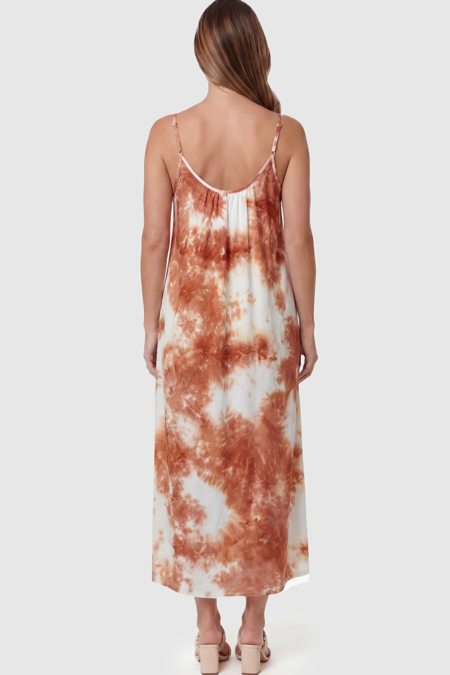 Tie-Dye Print Spaghetti Strap Maternity Maxi Dress Tie-Dye Print Spaghetti Strap Maternity Maxi Dress in Pink and White on a pregnant model.