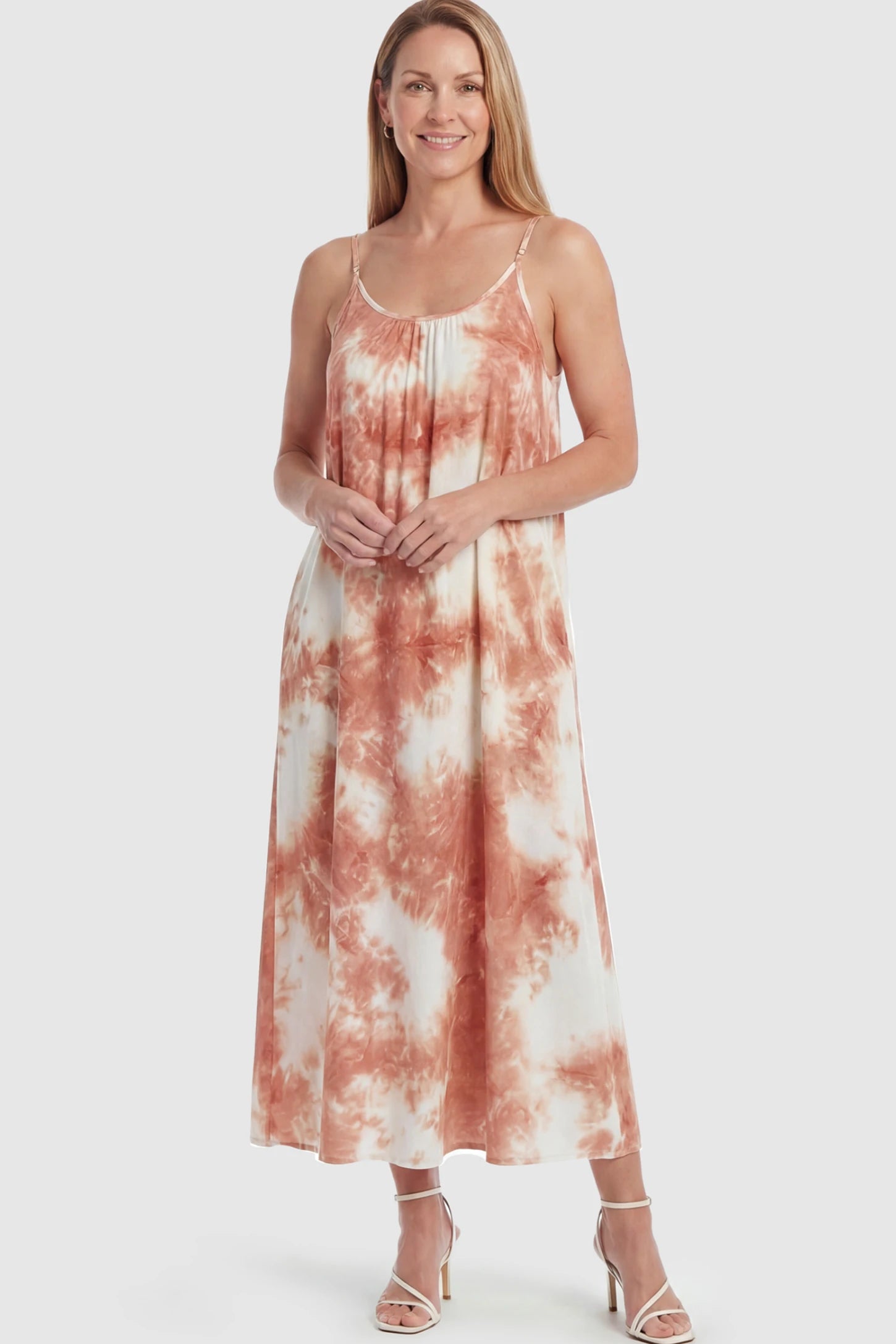 Tie-Dye Print Spaghetti Strap Maternity Maxi Dress Tie-Dye Print Spaghetti Strap Maternity Maxi Dress in Pink and White featuring side pockets on a postpartum model.