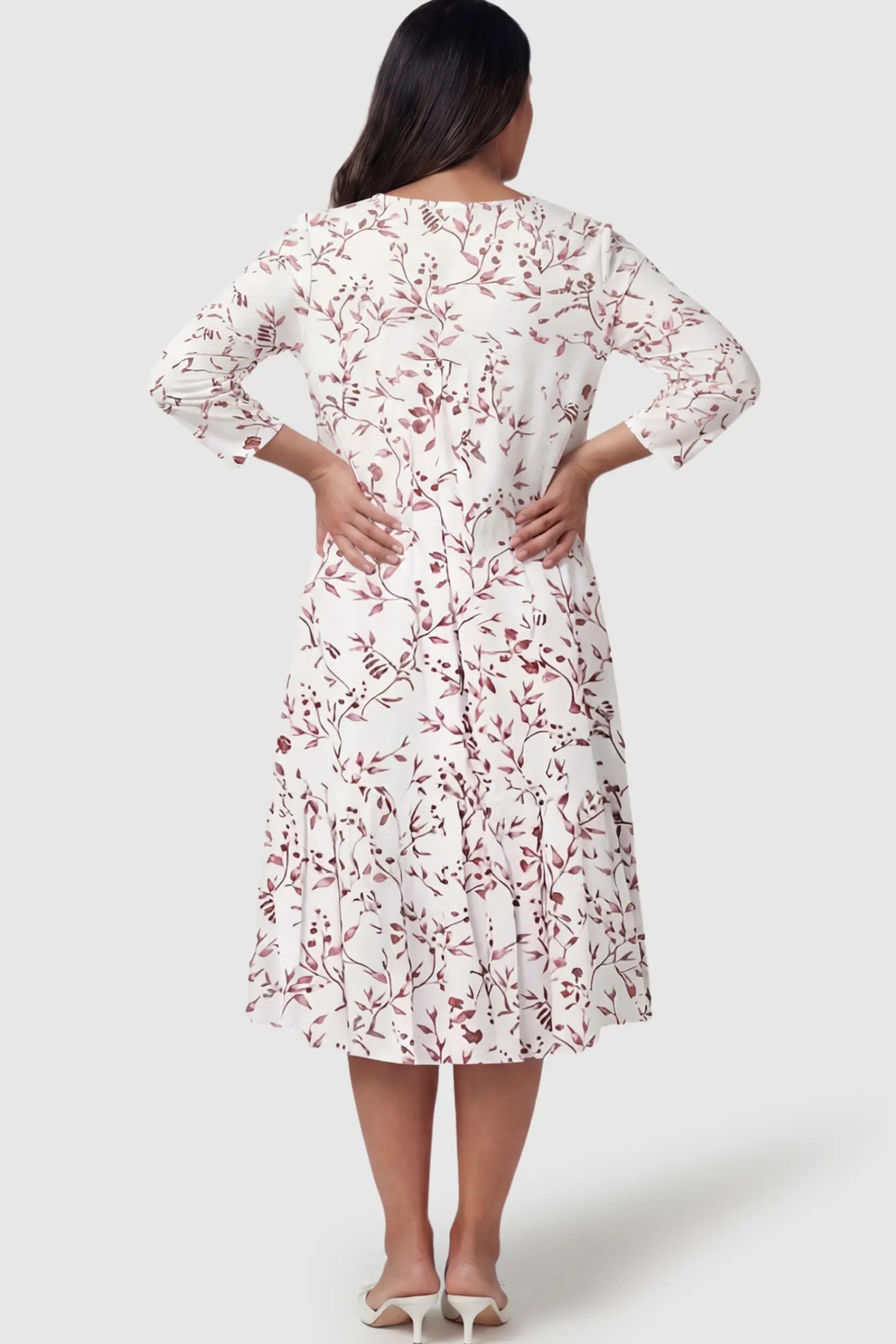 Floral Scoop Neck Tiered Maternity Midi Dress Floral Scoop Neck Tiered Midi Maternity Dress in Rose featuring a sweet tiered skirt on a pregnant model.