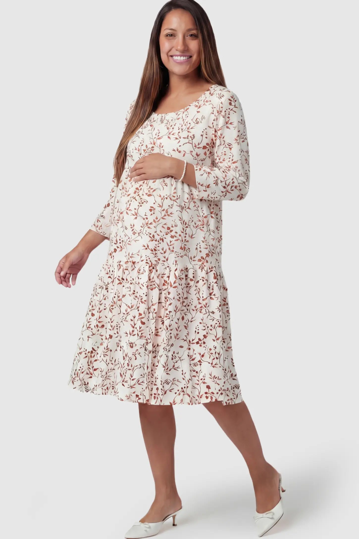 Floral Scoop Neck Tiered Maternity Midi Dress Floral Scoop Neck Tiered Midi Maternity Dress in Rose featuring a sweet tiered skirt on a pregnant model.