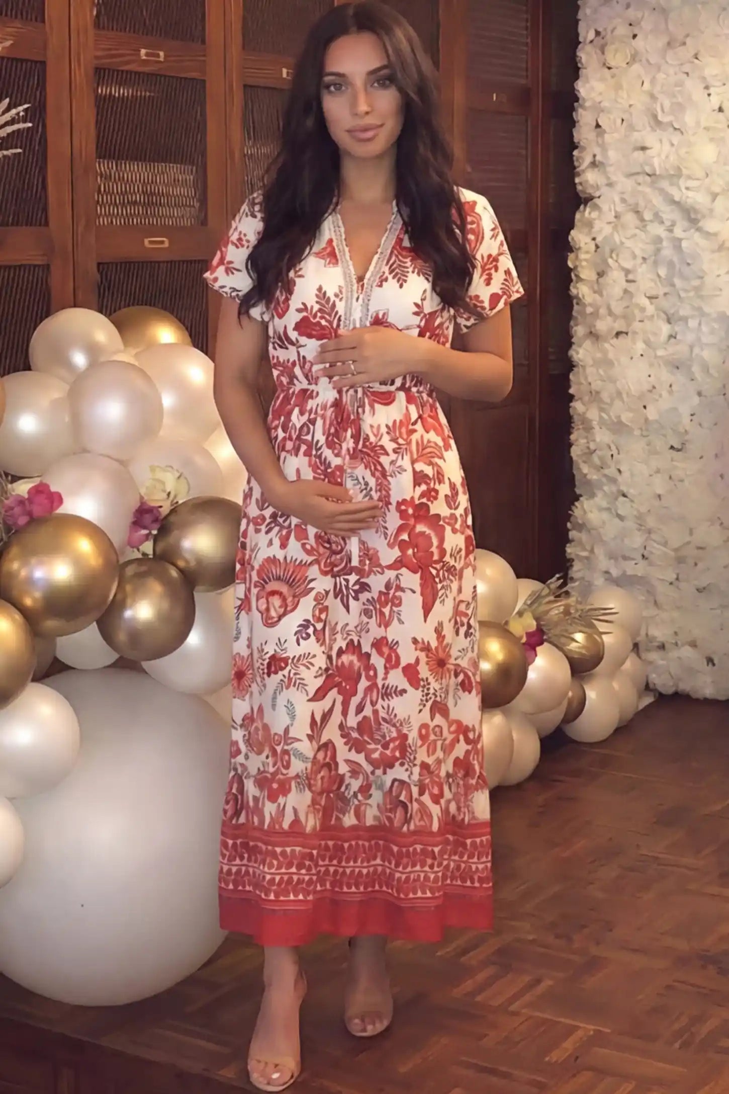 Retro Floral Print V-Neck Midi Maternity Dress in red featuring a cinched drawstring waist on a pregnant woman.