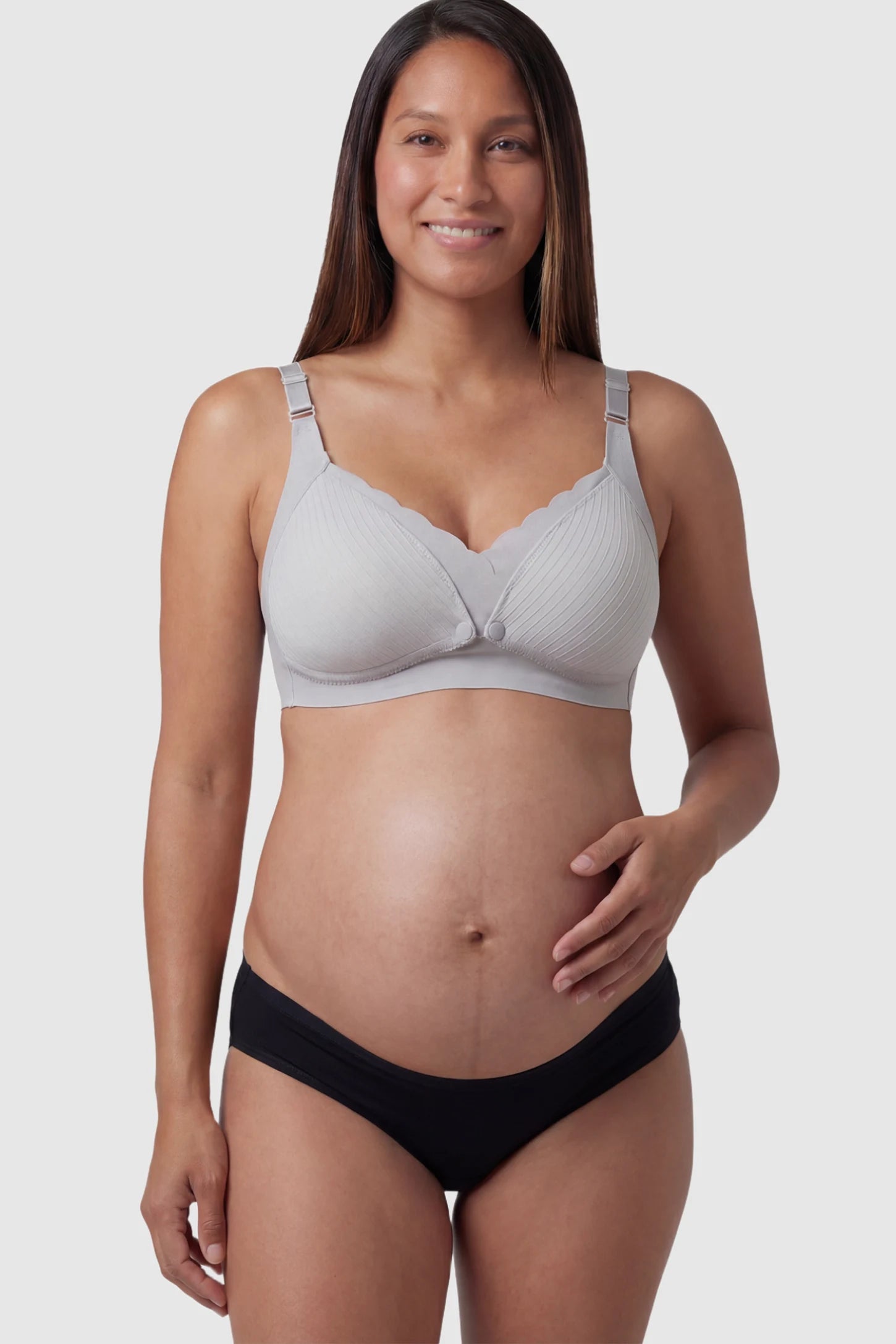 Textured Wire Free Front Snap Maternity Nursing Bra Textured Wire-Free Front-Snap Maternity Nursing Bra in Gray featuring breathable ribbed fabric on a pregnant model.