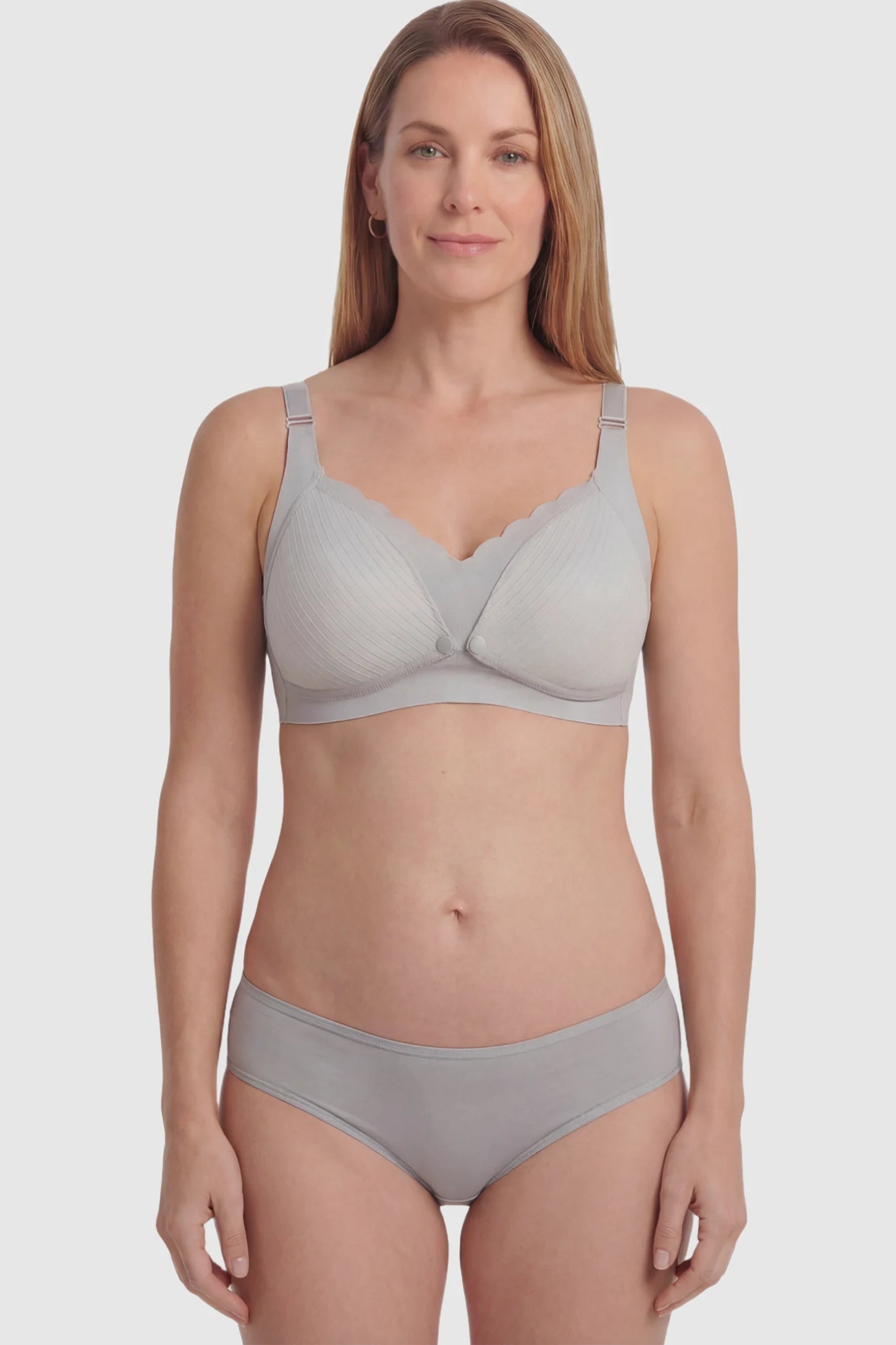 Textured Wire Free Front Snap Maternity Nursing Bra Textured Wire-Free Front-Snap Maternity Nursing Bra in Gray featuring breathable ribbed fabric on a postpartum model.