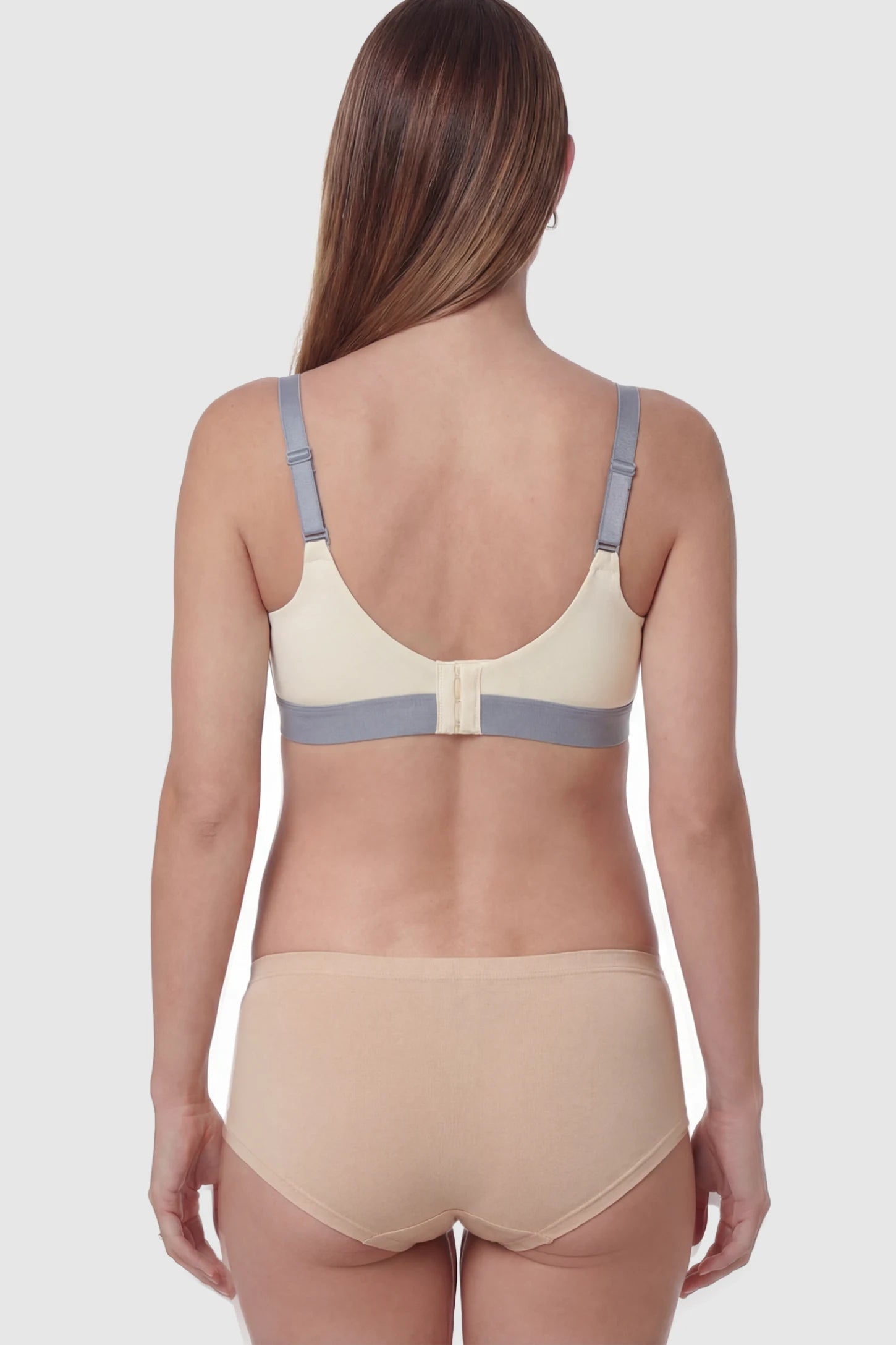 Floral Lace Front Button Maternity Nursing Bra in Skin featuring a wide grey elastic underband on a pregnant model.