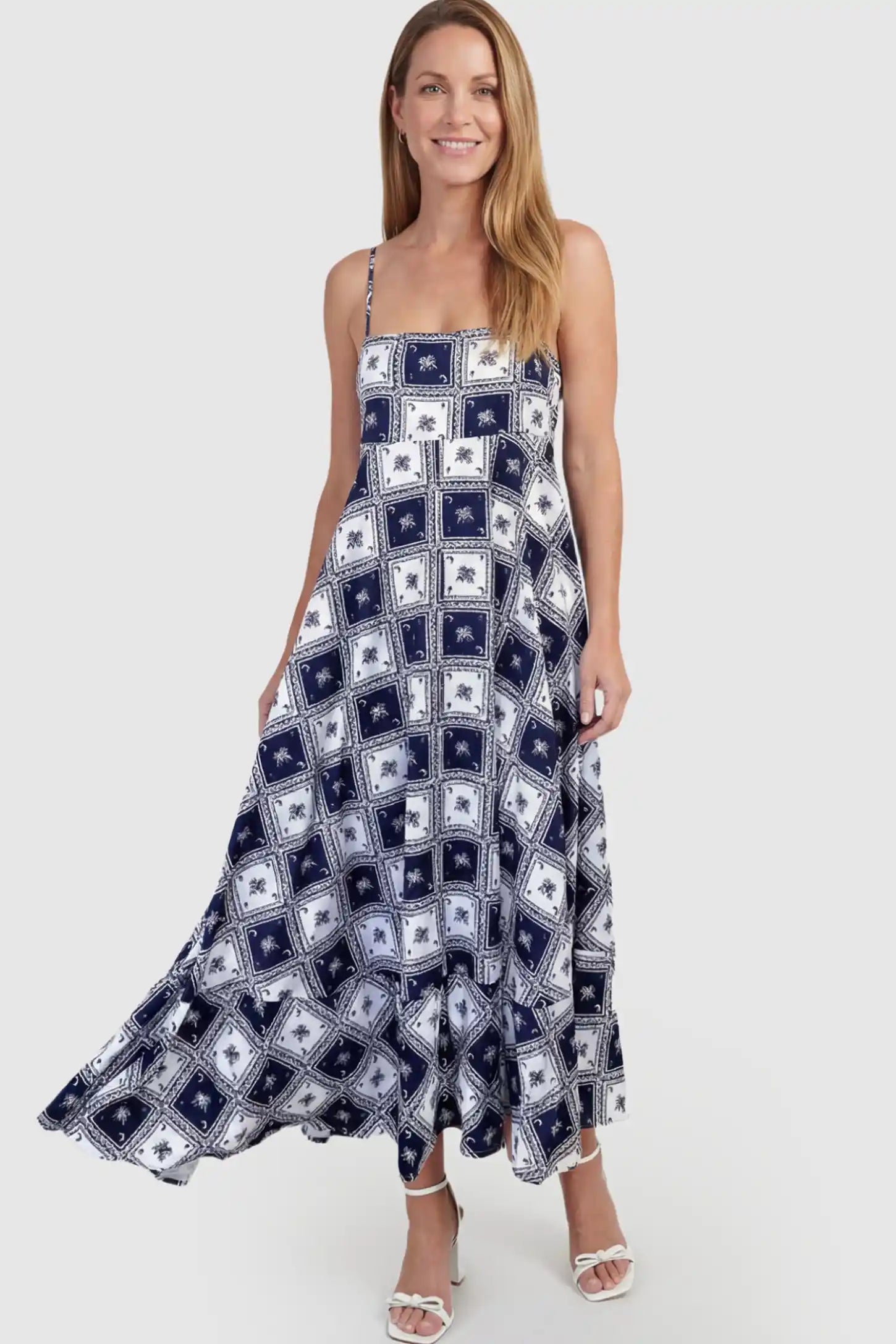 Black Square Print Spaghetti Strap Maternity Maxi Dress Black Square Print Spaghetti Strap Maternity Maxi Dress in a geometric tile pattern on a postpartum model.