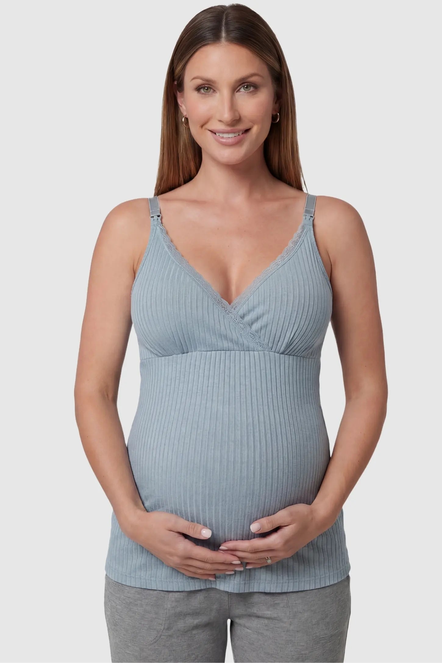 Padded Ribbed Maternity & Nursing Camisole Blue Padded Ribbed Maternity Camisole with lace-trim V-neckline on a pregnant model in a front view.