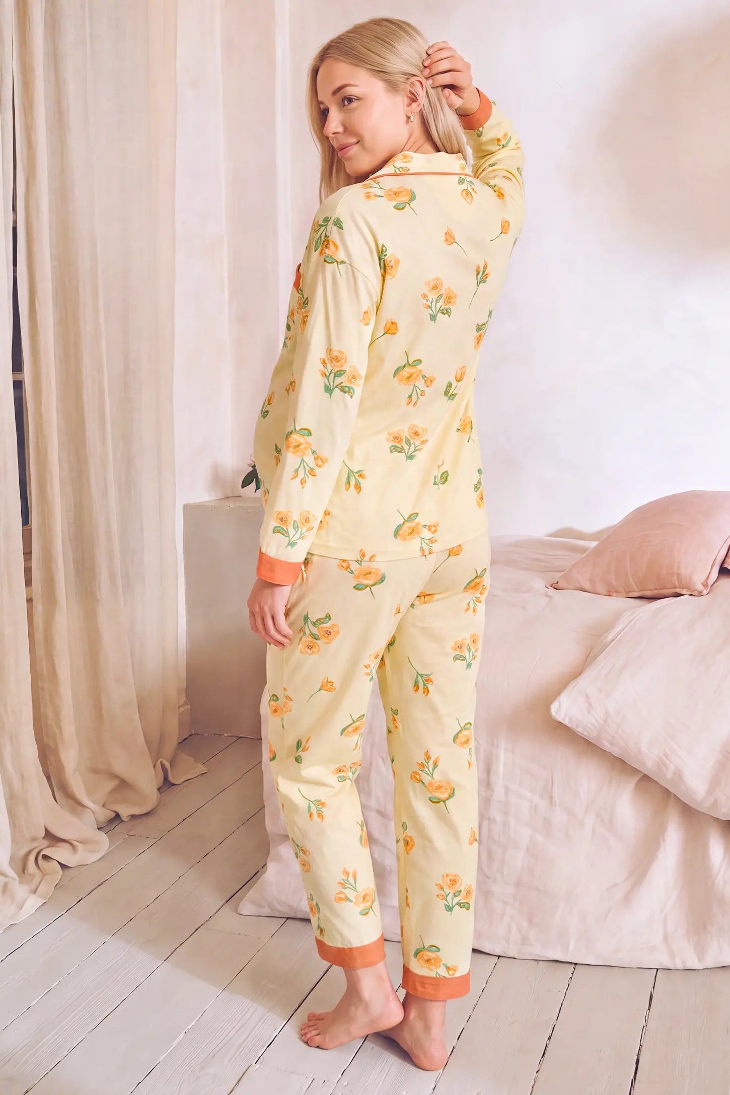 Peony Floral Organic Cotton Nursing PJ Set in Vintage Peony featuring full back coverage, elastic waist with adjustable tabs, and comfortable organic cotton loungewear style on a pregnant model, back view.