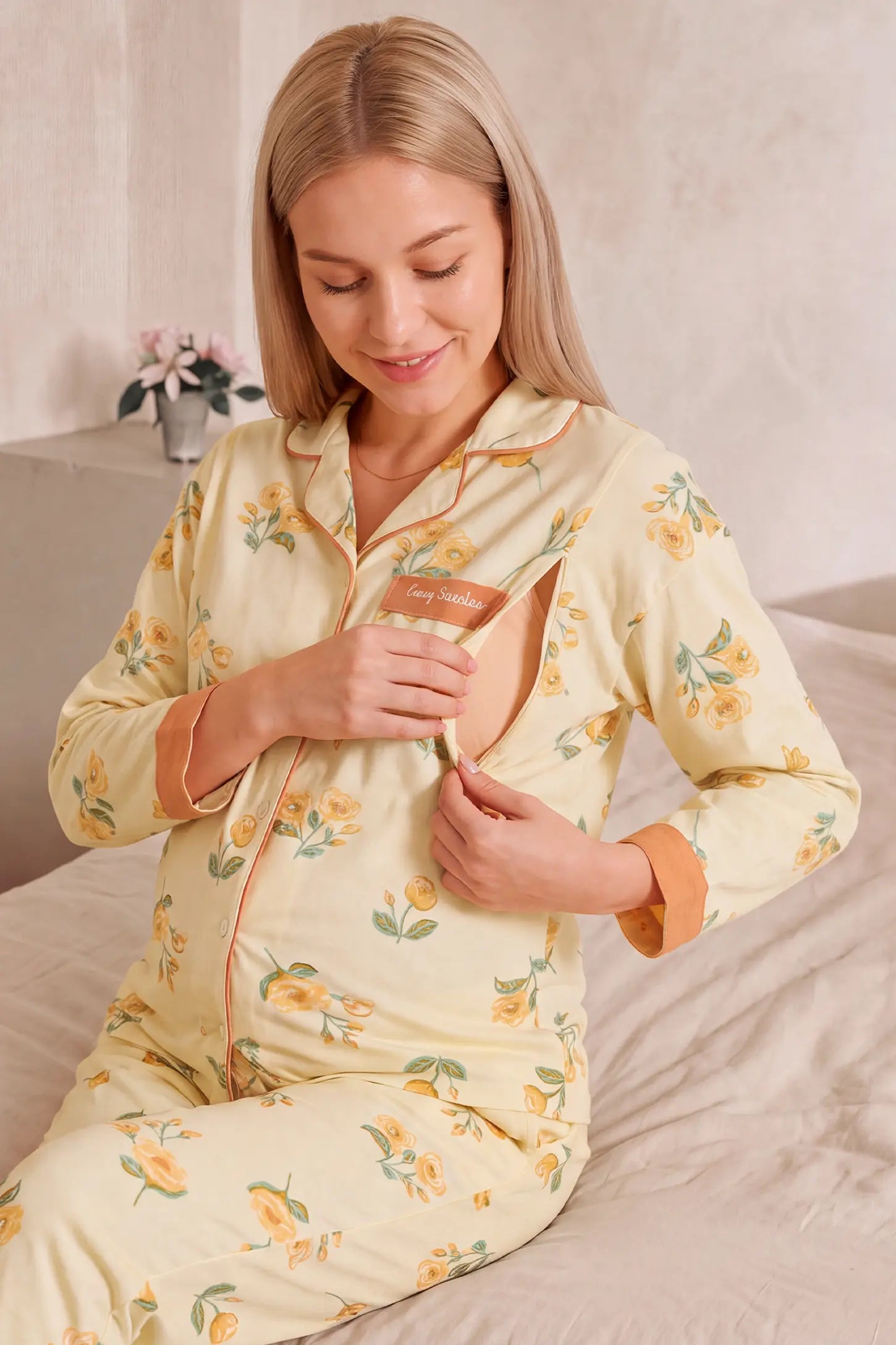 Peony Floral Organic Cotton Nursing PJ Set Peony Floral Organic Cotton Nursing PJ Set in Vintage Peony featuring easy nursing access opening, soft stretch fabric, and functional postpartum design on a model, nursing demonstration view.