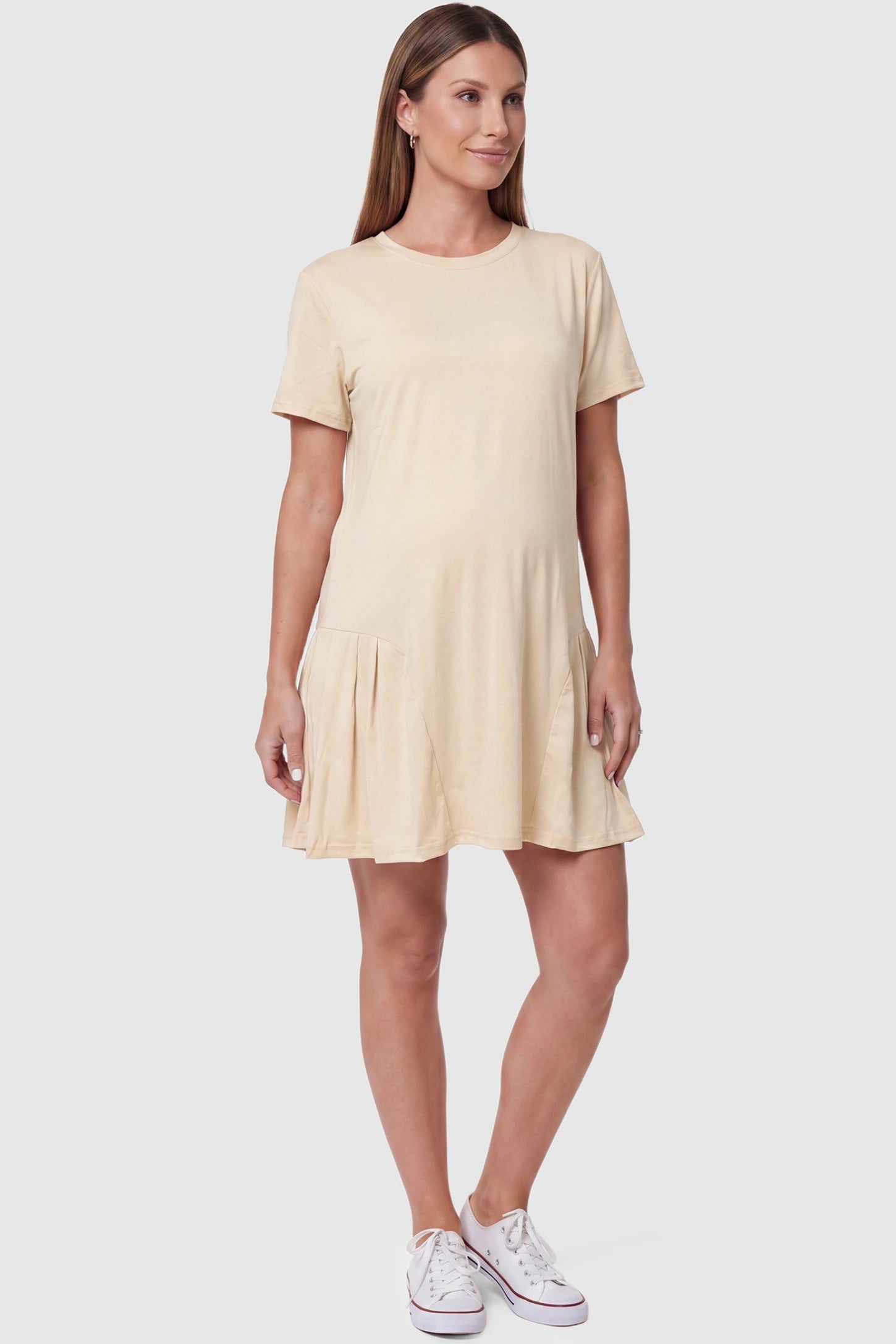 Pleated Hem A-line Maternity Short Dress Pleated hem A-line maternity short dress in beige with classic round neckline, front view on pregnant model