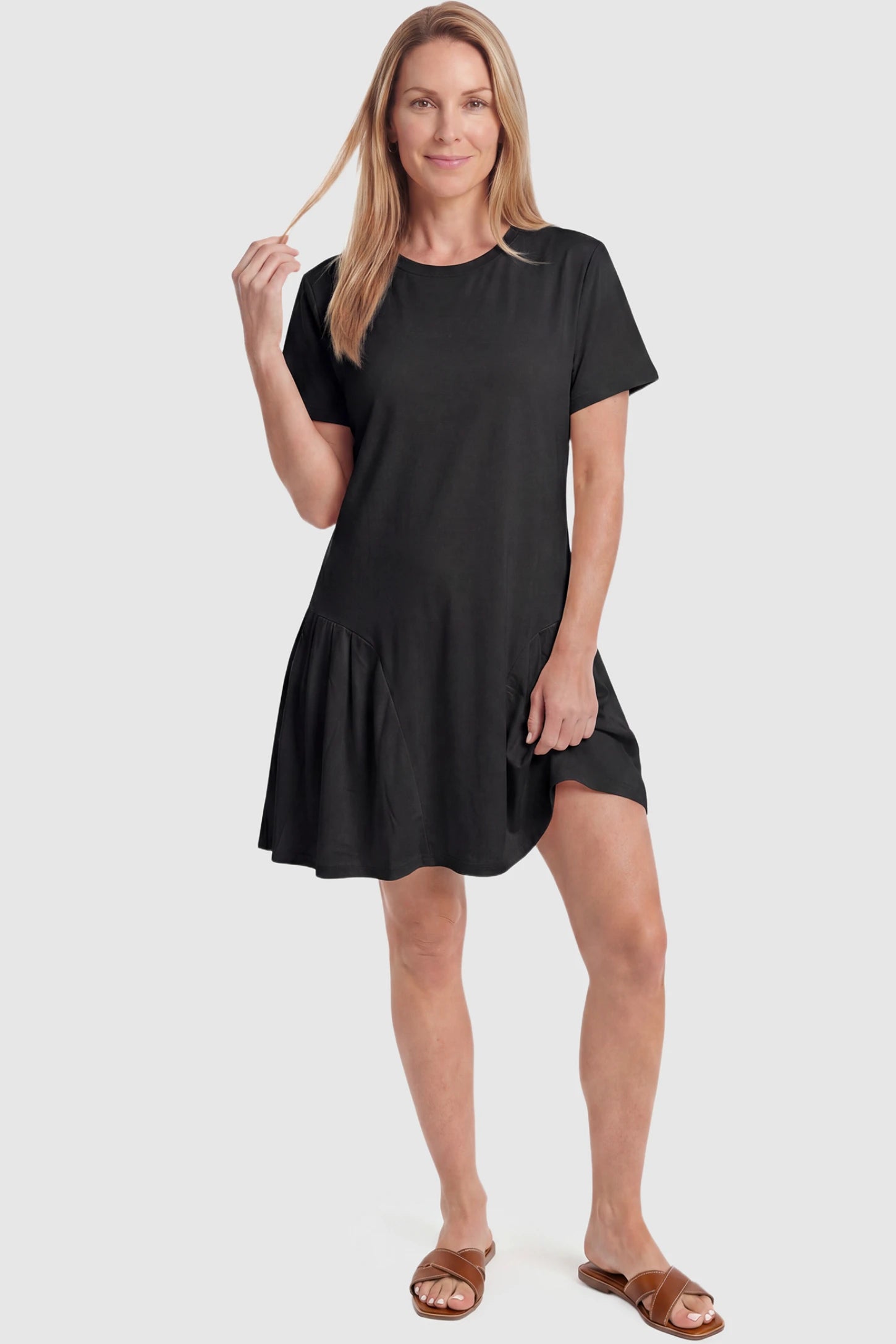 Pleated Hem A-line Maternity Short Dress Pleated hem A-line maternity short dress in black with classic round neckline, front view on postpartum model