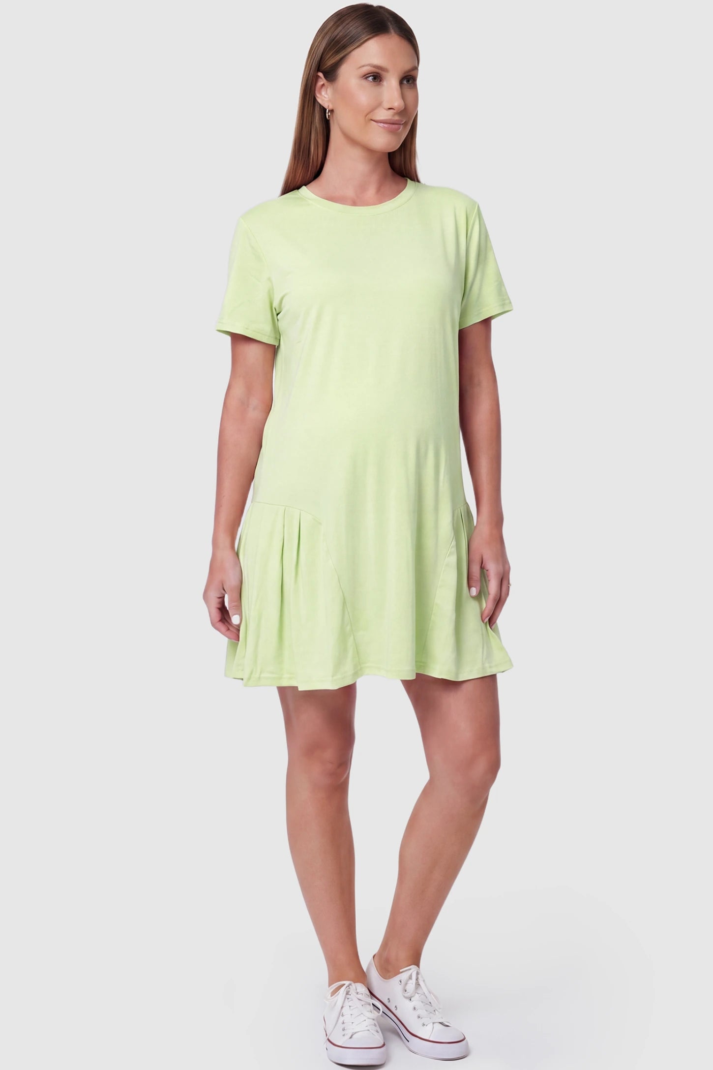 Pleated Hem A-line Maternity Short Dress Pleated hem A-line maternity short dress in green with classic round neckline, front view on pregnant model