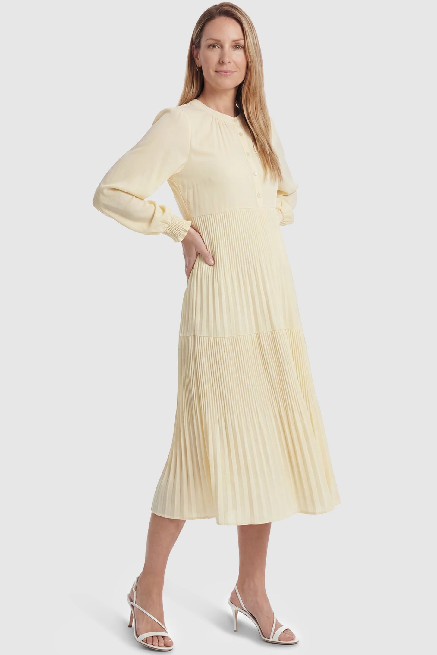 Button-Up Neck Pleated Tiered Maternity Midi Dress Button-up neck pleated tiered maternity midi dress in pale yellow with soft pleated design, front view on postpartum model