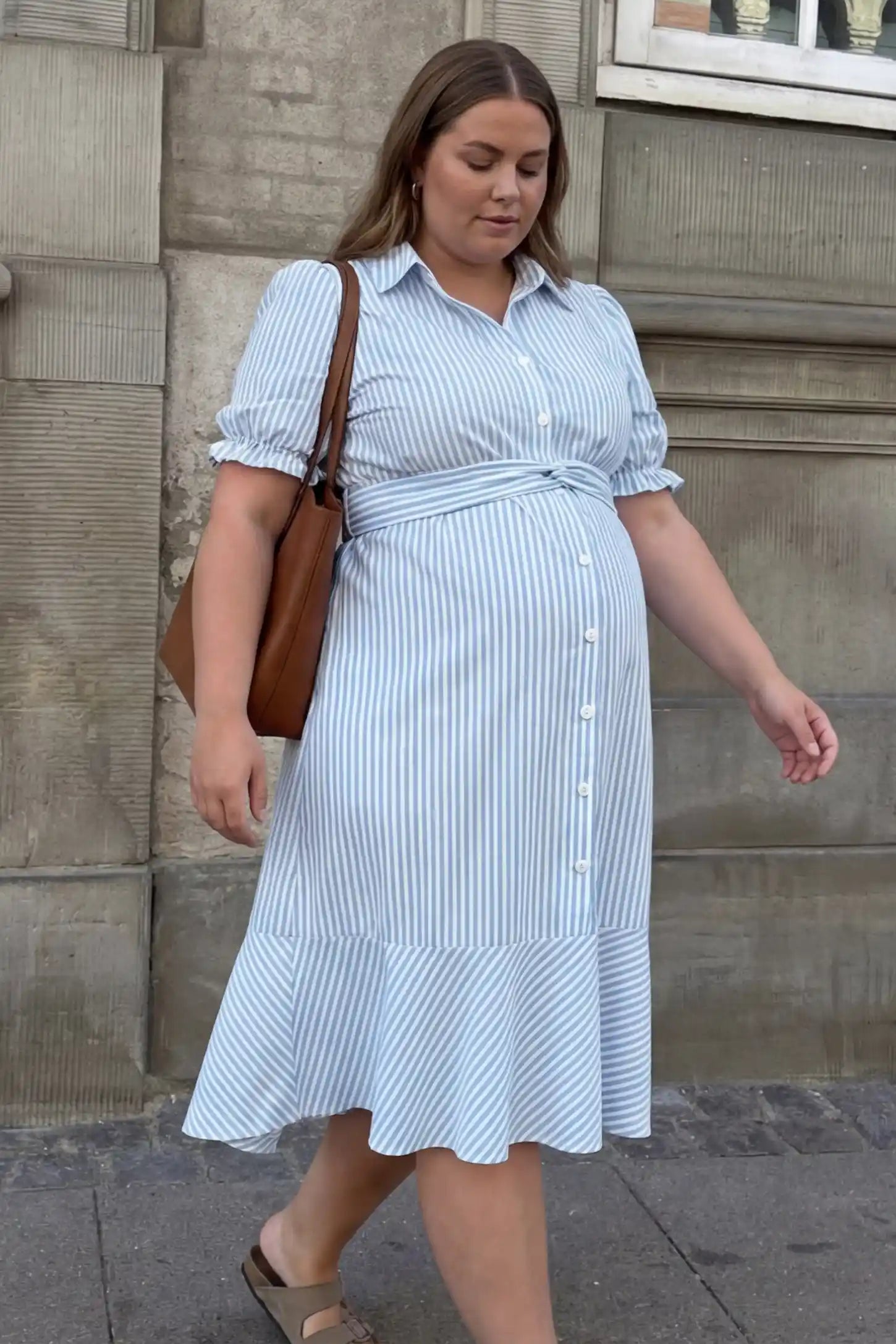 Striped lapel puff sleeve A-line midi maternity dress in blue with breathable fabric, lifestyle UGC model