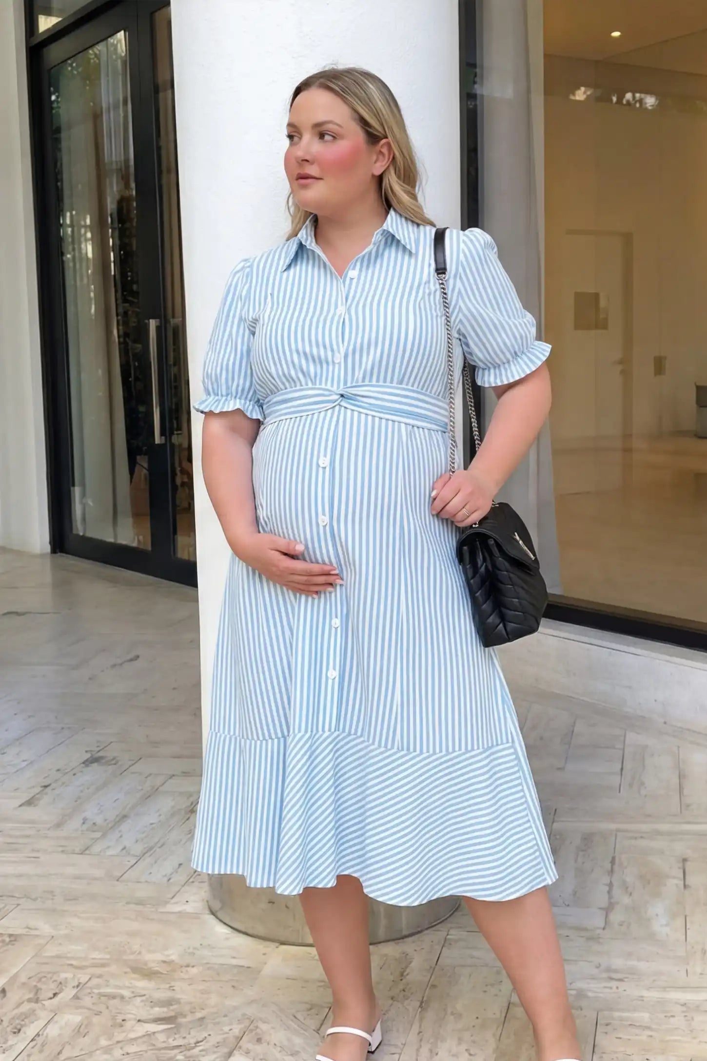 Striped Lapel Puff Sleeve A-Line Midi Maternity Dress Striped lapel puff sleeve A-line midi maternity dress in blue with elegant silhouette, front view on an editorial lifestyle model