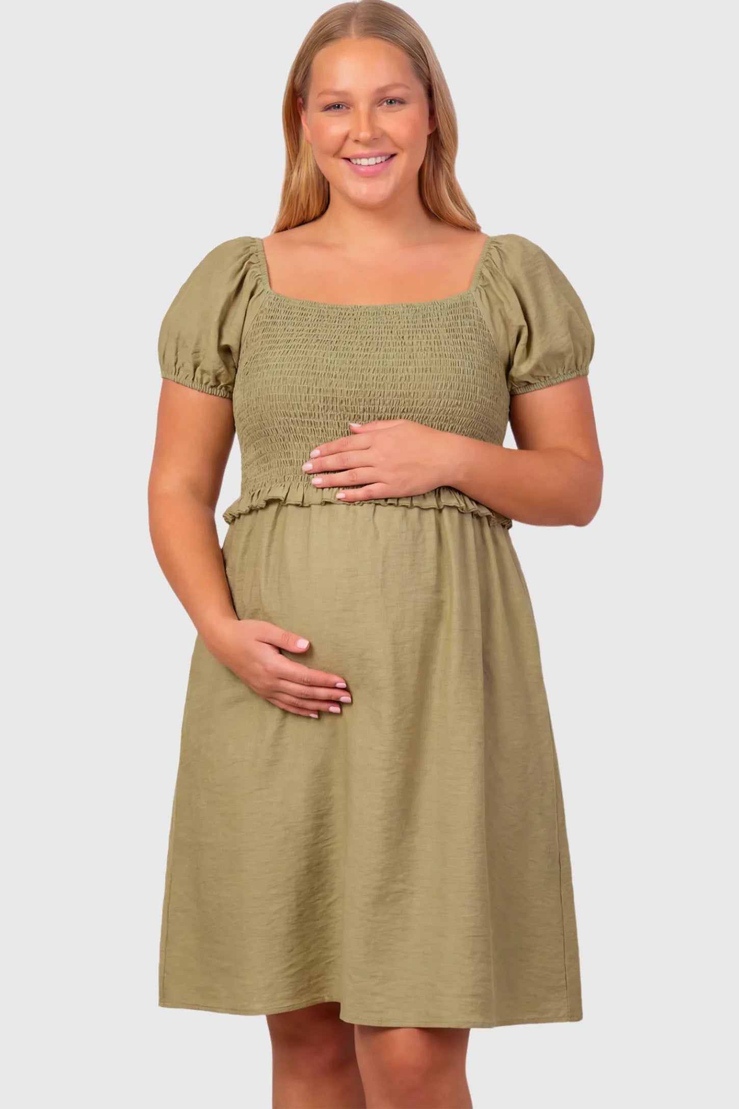 Short Puff Sleeve Empire Waist Maternity & Nursing Midi Dress Short Puff Sleeve Empire Waist Maternity & Nursing Midi Dress in olive green featuring a square neck, smocked bodice, and A-line silhouette on a plus size pregnant model.