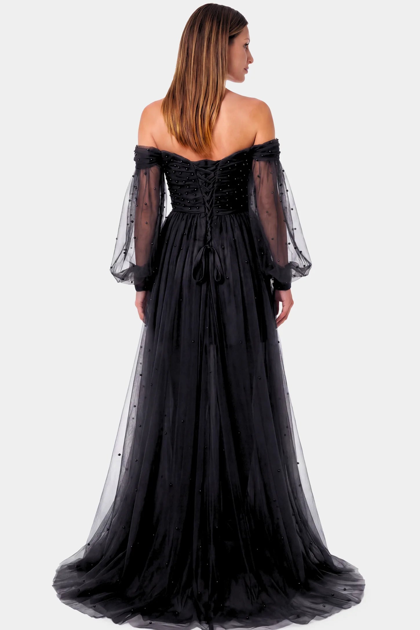 Off-Shoulder Empire Waist Maternity Gown Off-Shoulder Empire Waist Maternity Gown in black featuring a sweetheart neckline and flowy A-line silhouette on a pregnant model.