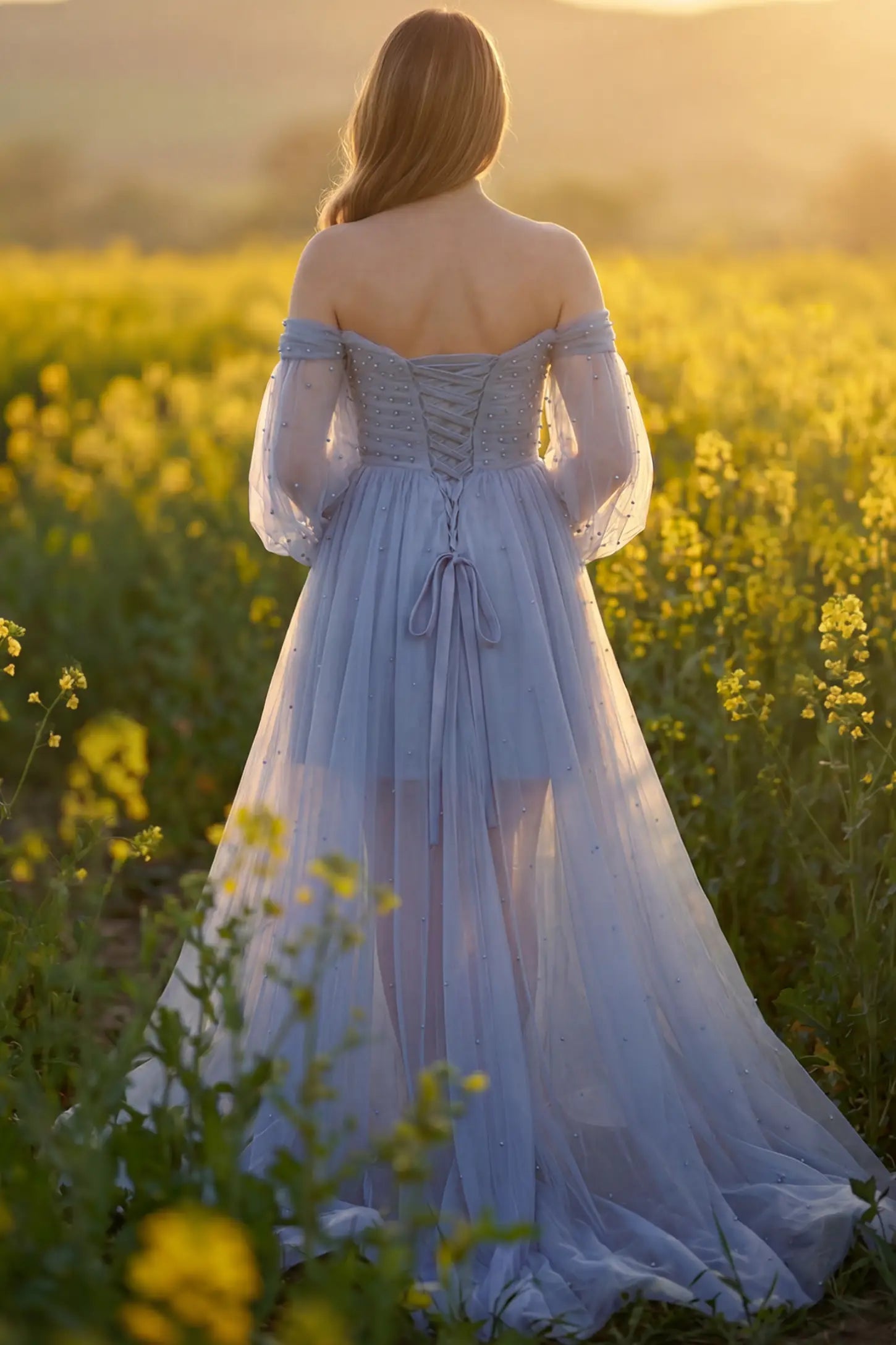 Off-Shoulder Empire Waist Maternity Gown Off-Shoulder Empire Waist Maternity Gown in blue featuring a sweetheart neckline and flowy A-line silhouette on a pregnant model, back view.