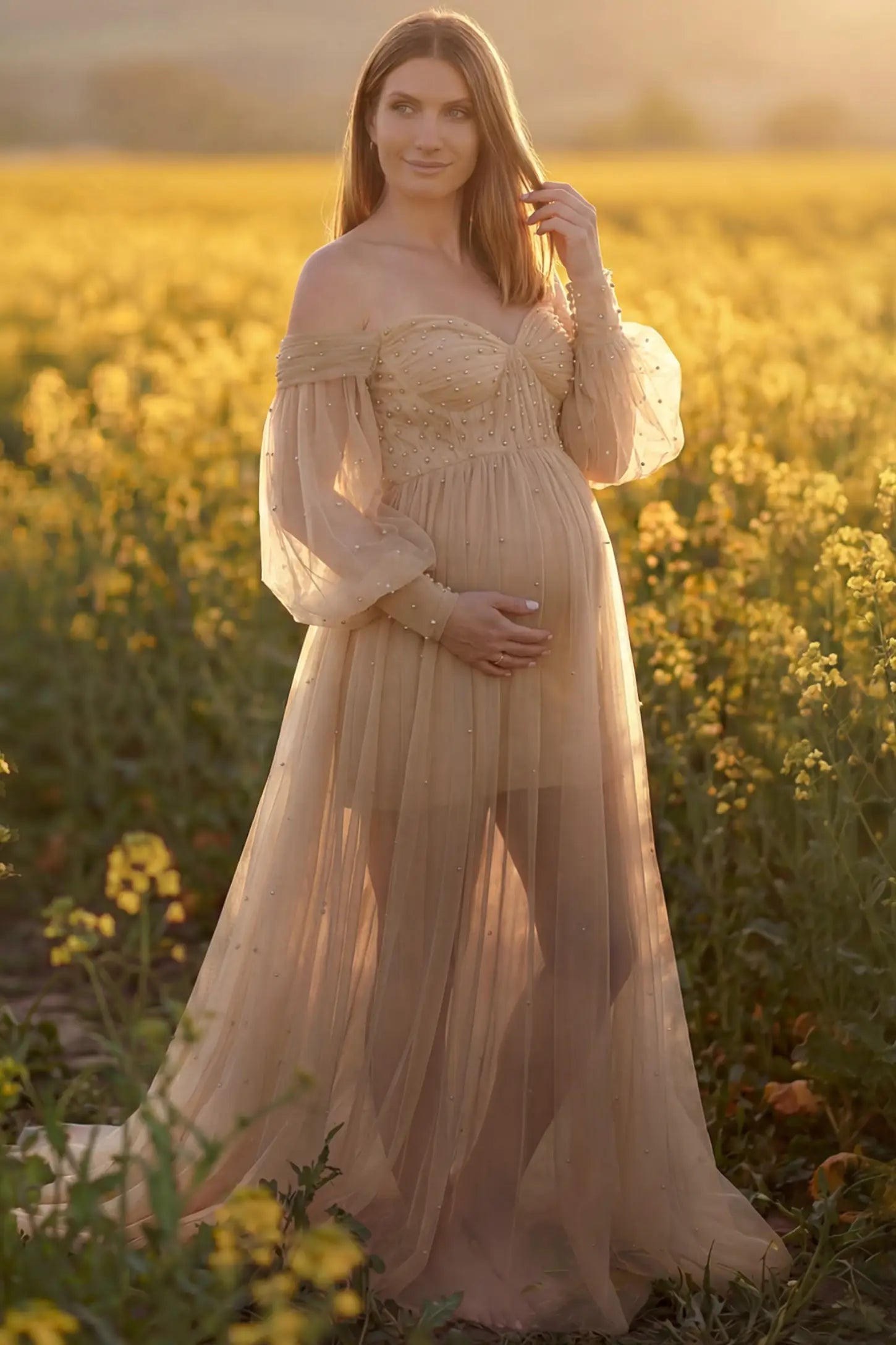 Off-Shoulder Empire Waist Maternity Gown Off-Shoulder Empire Waist Maternity Gown in camel featuring a sweetheart neckline and flowy A-line silhouette on a pregnant model, front view.