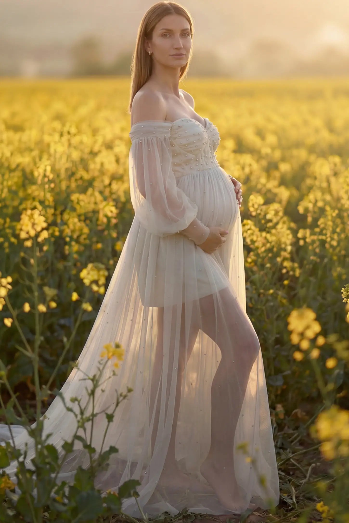 Off-Shoulder Empire Waist Maternity Gown in ivory featuring a sweetheart neckline and flowy A-line silhouette on a pregnant model, side view.