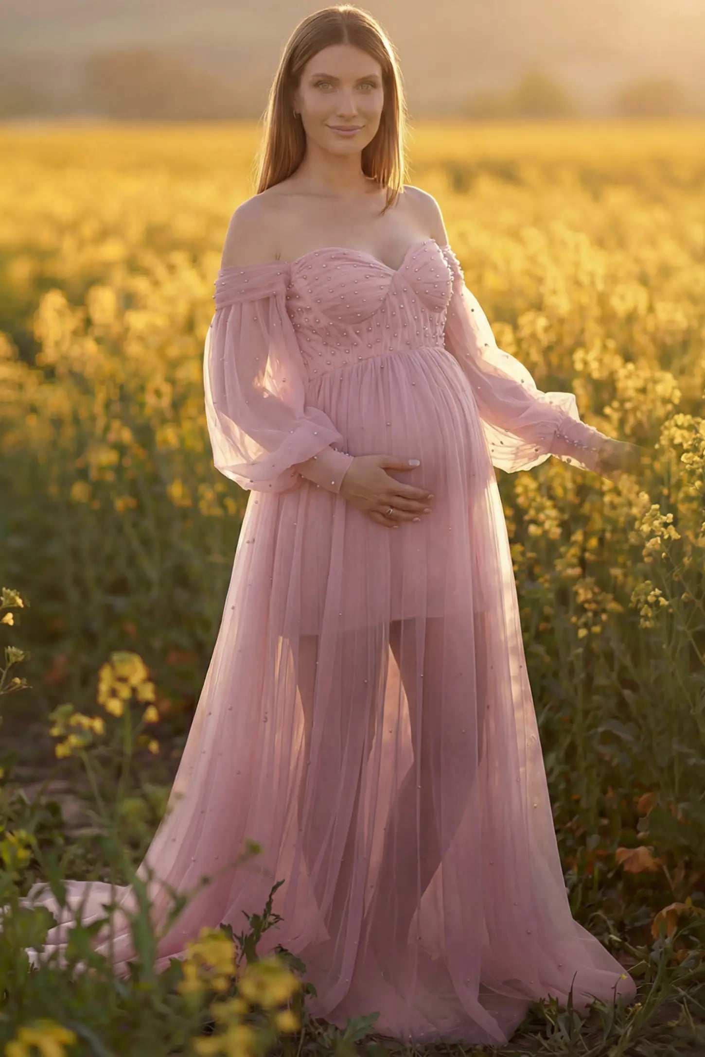 Off-Shoulder Empire Waist Maternity Gown Off-Shoulder Empire Waist Maternity Gown in pink featuring a sweetheart neckline and flowy A-line silhouette on a pregnant model, front view.