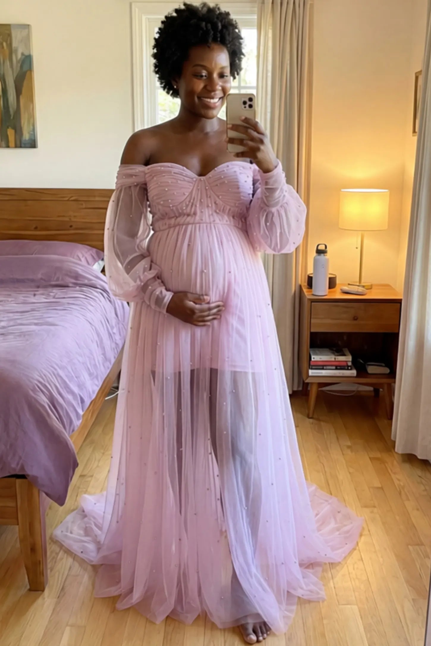 Off-Shoulder Empire Waist Maternity Gown Off-Shoulder Empire Waist Maternity Gown in pink featuring a sweetheart neckline and flowy A-line silhouette on a pregnant woman front view.