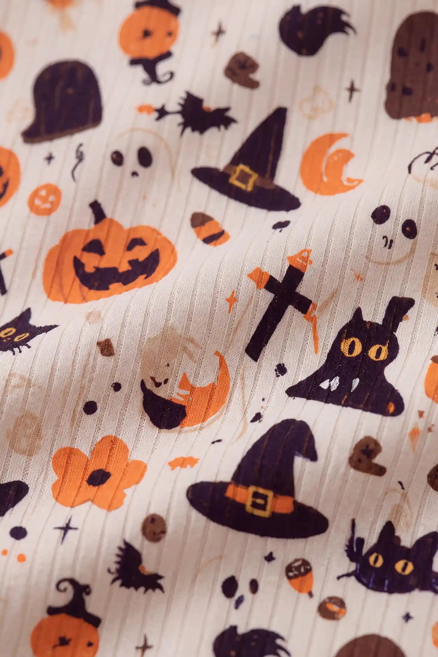 Pumpkin & Ghost Print Soft Knit Maternity Sleep Set Pumpkin & Ghost Print Soft Knit Maternity Sleep Set in Whimsical Halloween featuring playful pumpkin and witch hat patterns, soft ribbed knit material, and slight stretch texture, close-up fabric view.