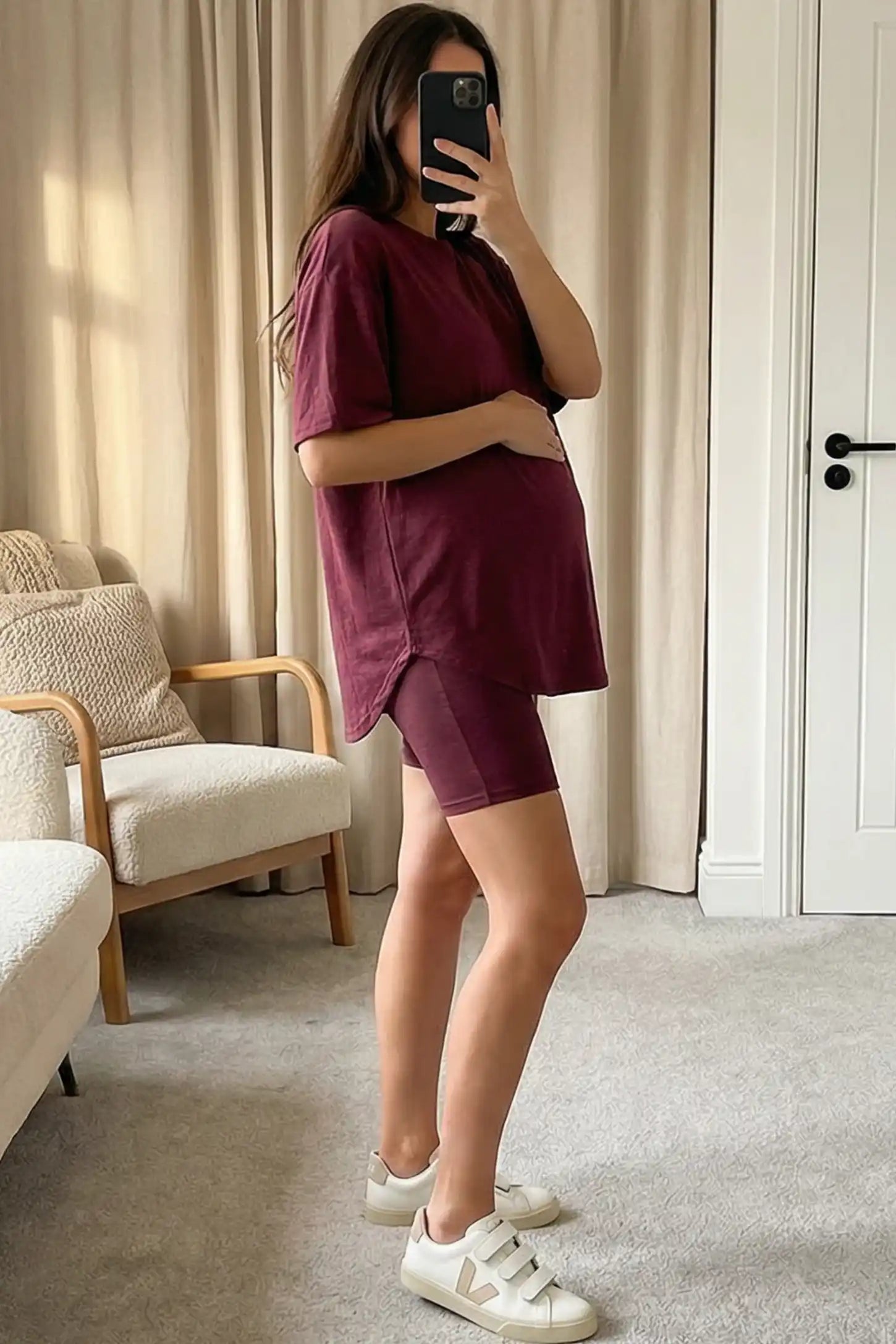 Stretch Oversized Tee & Biker Short Maternity Lounge Set Stretch Oversized Tee & Biker Short Maternity Lounge Set in burgundy featuring relaxed-fit T-shirt and mid-thigh fitted biker shorts on pregnant model.