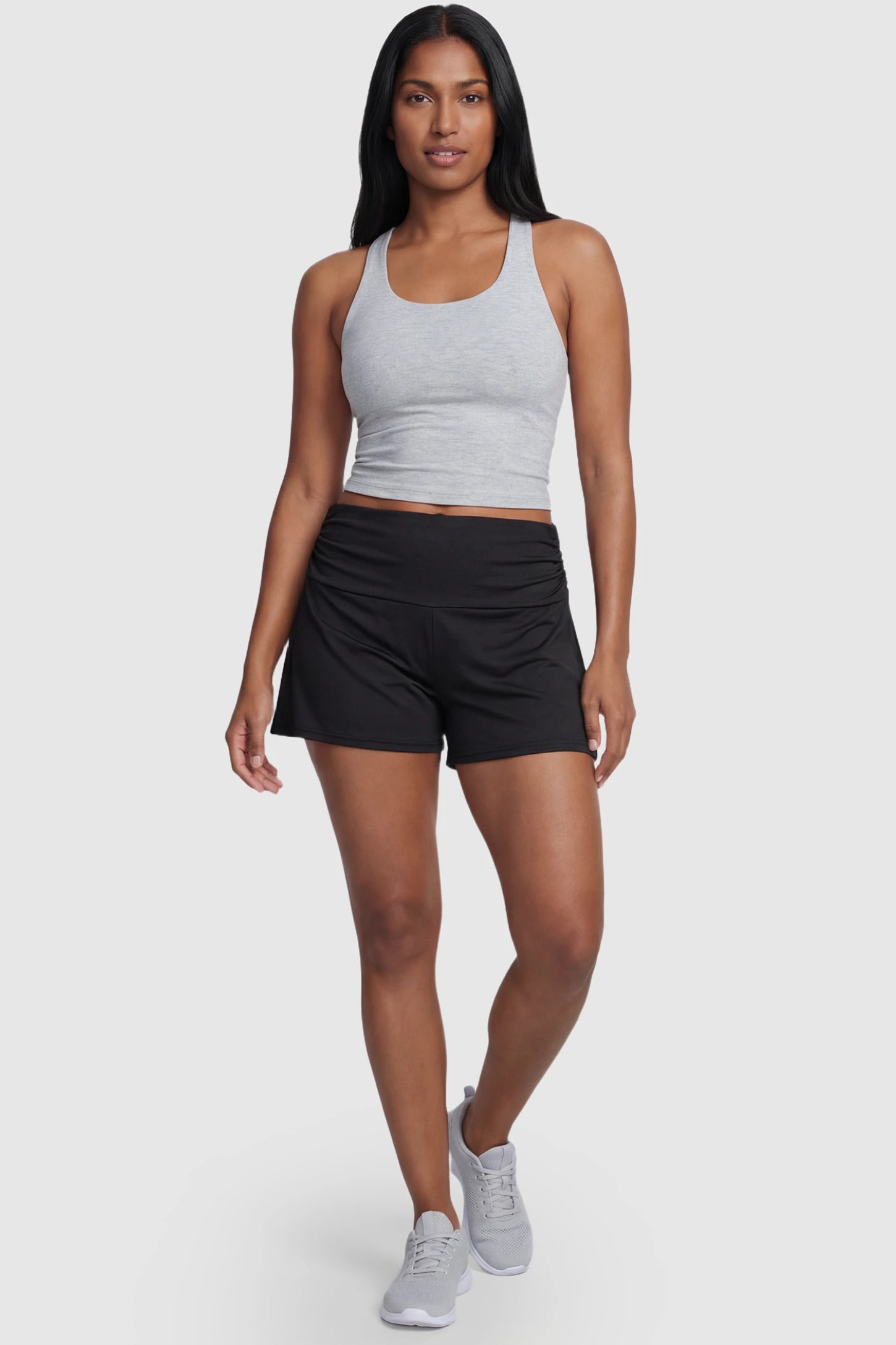Full Panel Relaxed-Fit Maternity Shorts Full Panel Relaxed-Fit Maternity Shorts in black featuring seamless belly band and mid-thigh length on non pregnant model front view.