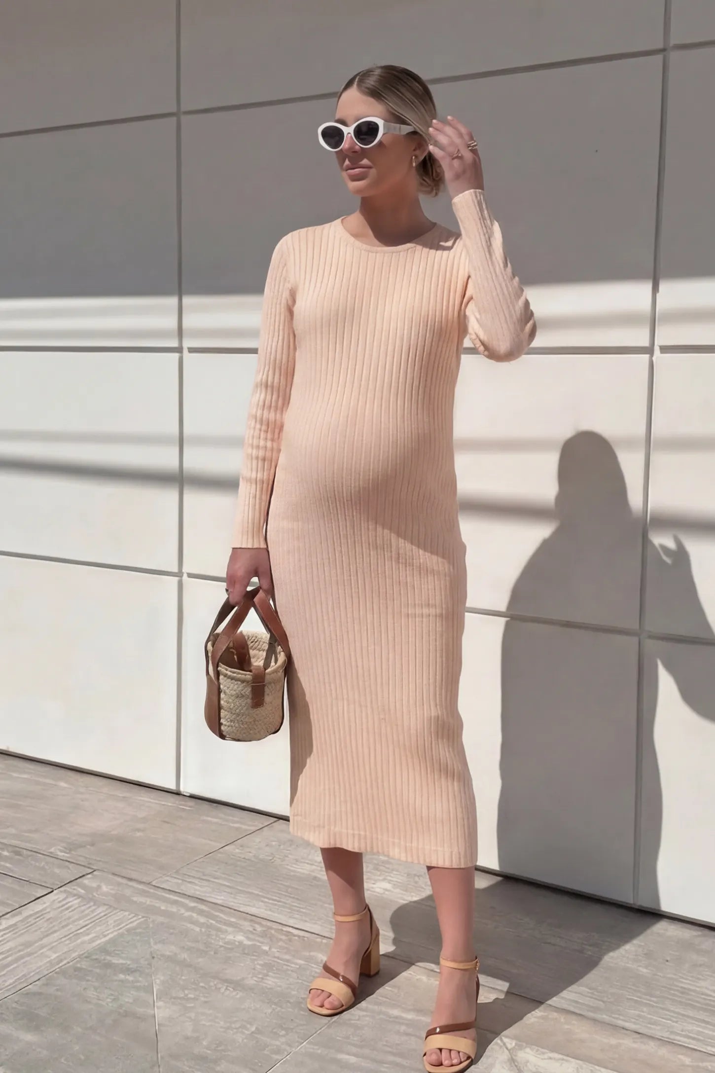 Ribbed Knit Long Sleeve Maternity Midi Dress Ribbed knit long sleeve maternity midi dress in khaki with smooth stretch ribbed knit fabric, front view on pregnant model