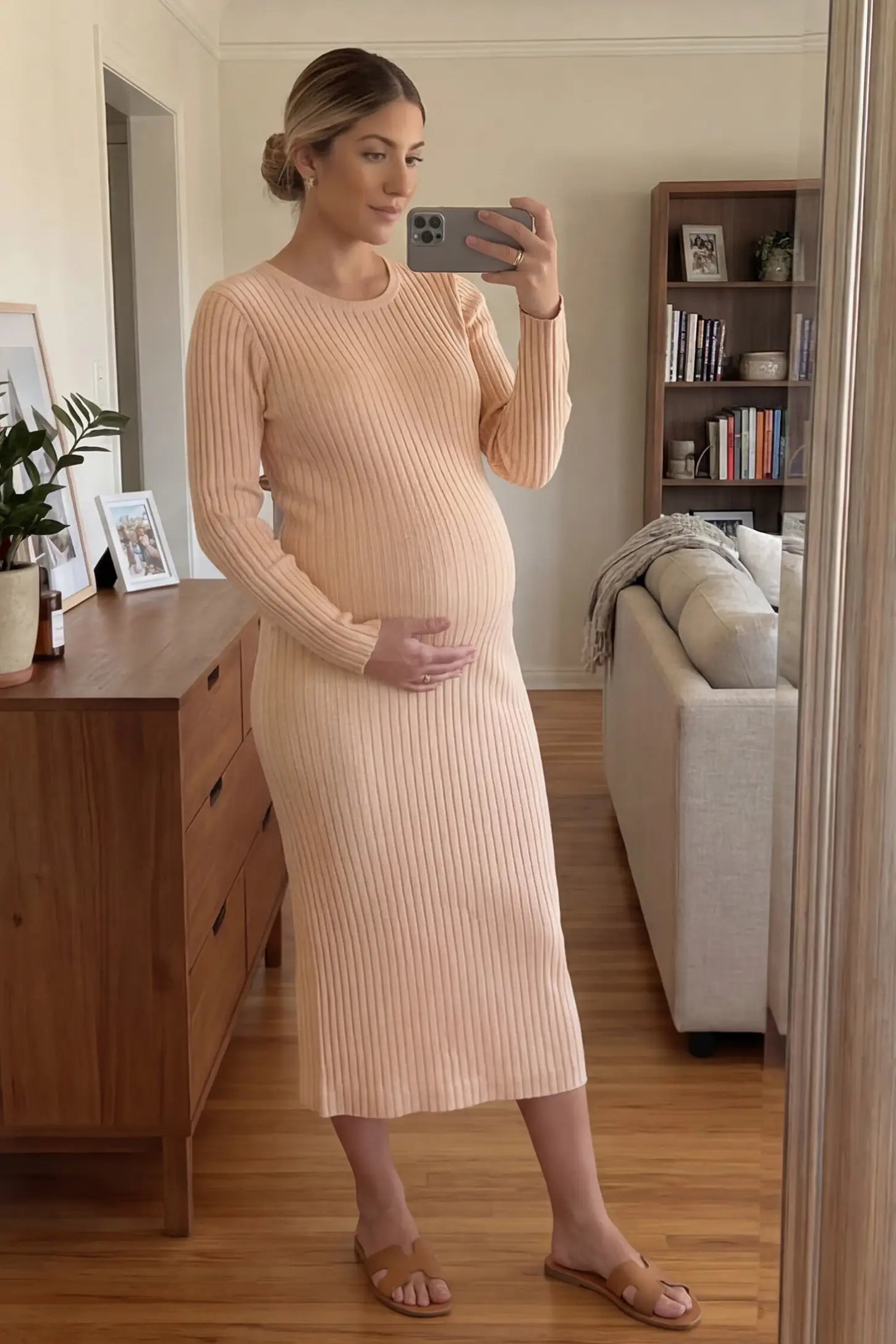 Ribbed Knit Long Sleeve Maternity Midi Dress Ribbed knit long sleeve maternity midi dress in khaki with smooth stretch ribbed knit fabric, front view on pregnant model