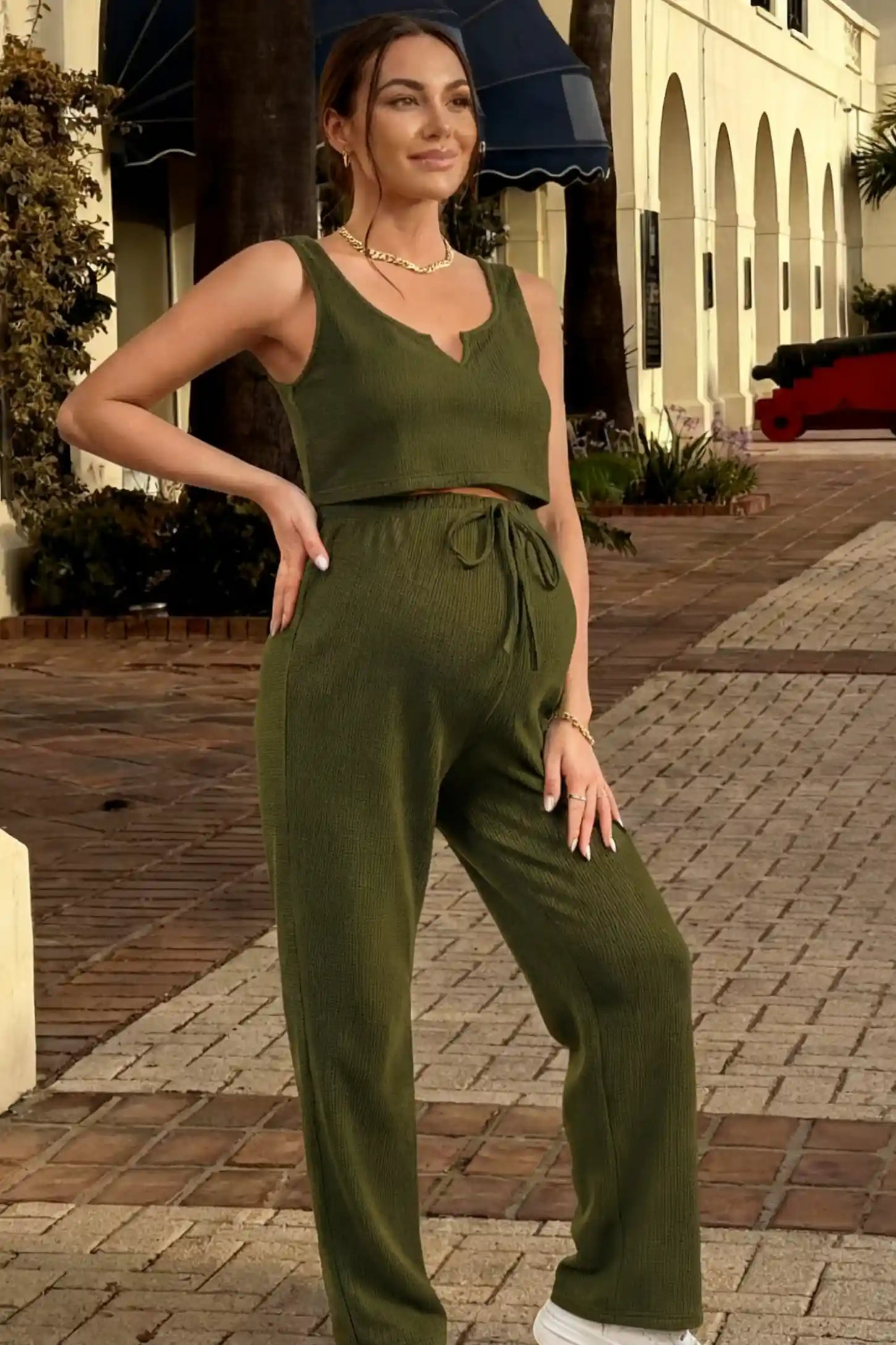 Ribbed Sleeveless Wide-Leg Maternity Lounge Set Ribbed Sleeveless Wide-Leg Maternity Lounge Set in army green featuring scoop neckline, cropped top, and high-rise wide-leg pants on pregnant model.